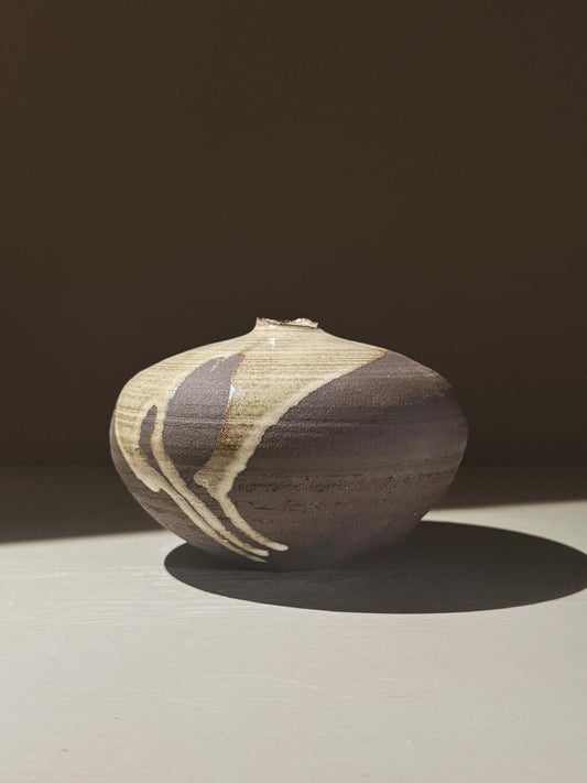Orb Vase – Yuki Black #01 showcasing natural glaze and unique rounded design, perfect for home decor.