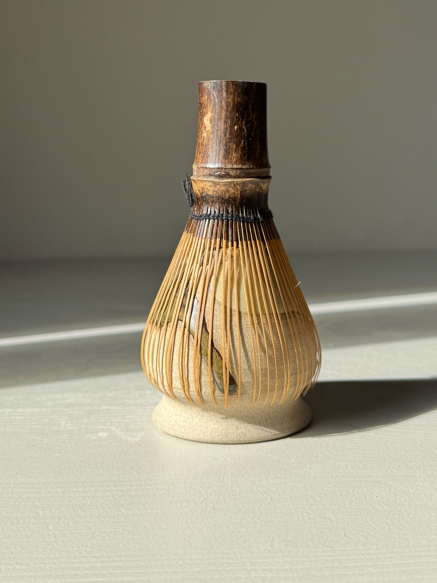 Whisk Holder - Inyo, handmade ceramic holder for a bamboo whisk, crafted with elegant design and warm toffee clay.