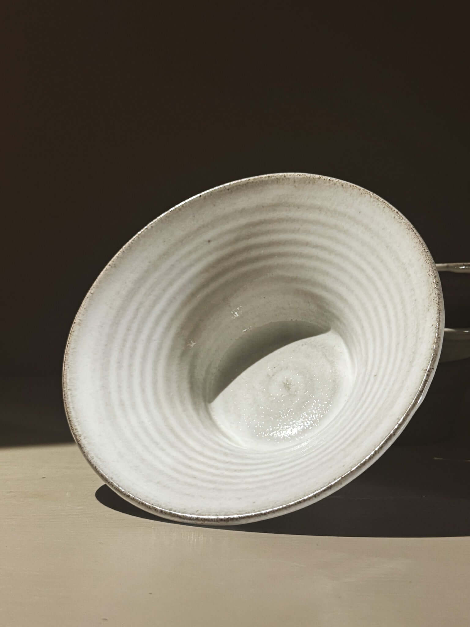 Bowl - Yuki Ash with ash-grey clay and glossy white glaze, showcasing subtle depth and variation.