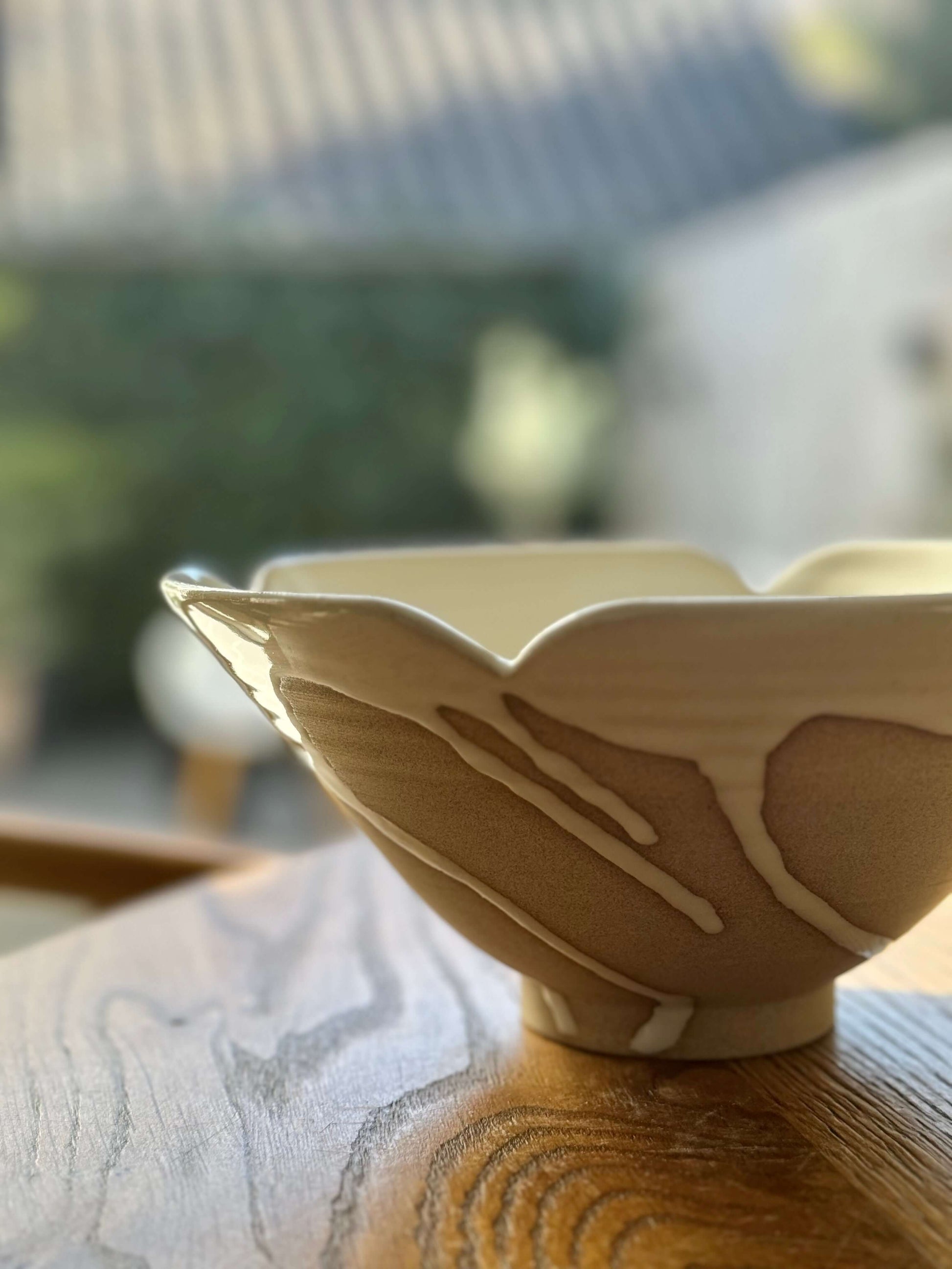 Handmade Yuki Series flower ramen bowl with scalloped rim and glossy finish, 20cm diameter and 10cm height, on wooden table.