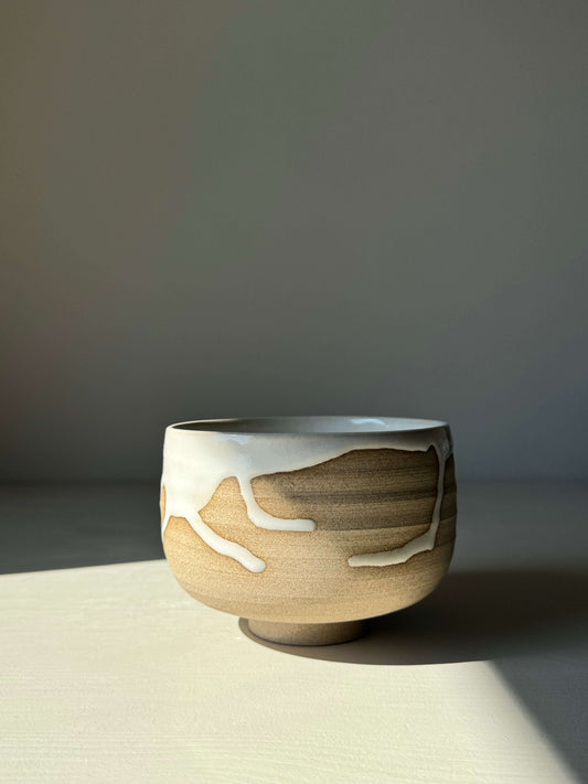 Handmade Matcha bowl from Yuki Series featuring toffee clay and white glaze, perfect for a grounding tea ritual.