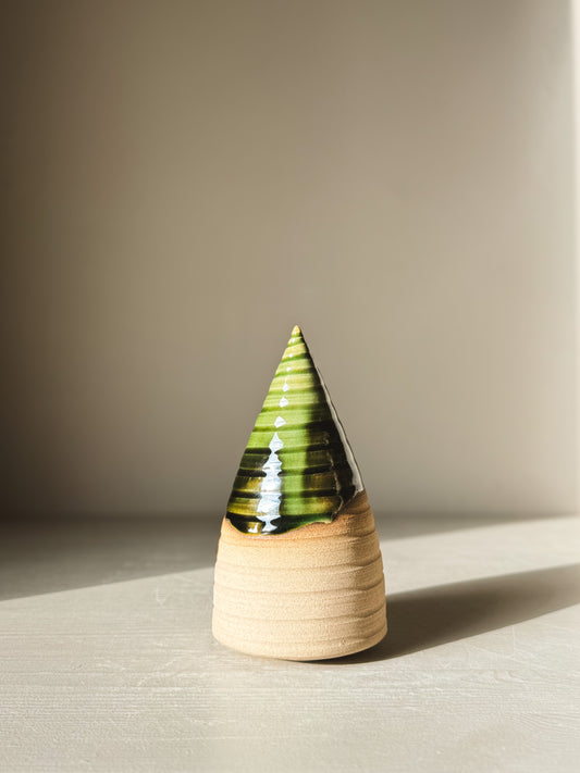 Textured Ceramic Tree – Mori #01 featuring forest-green glaze and visible throwing lines under natural light.