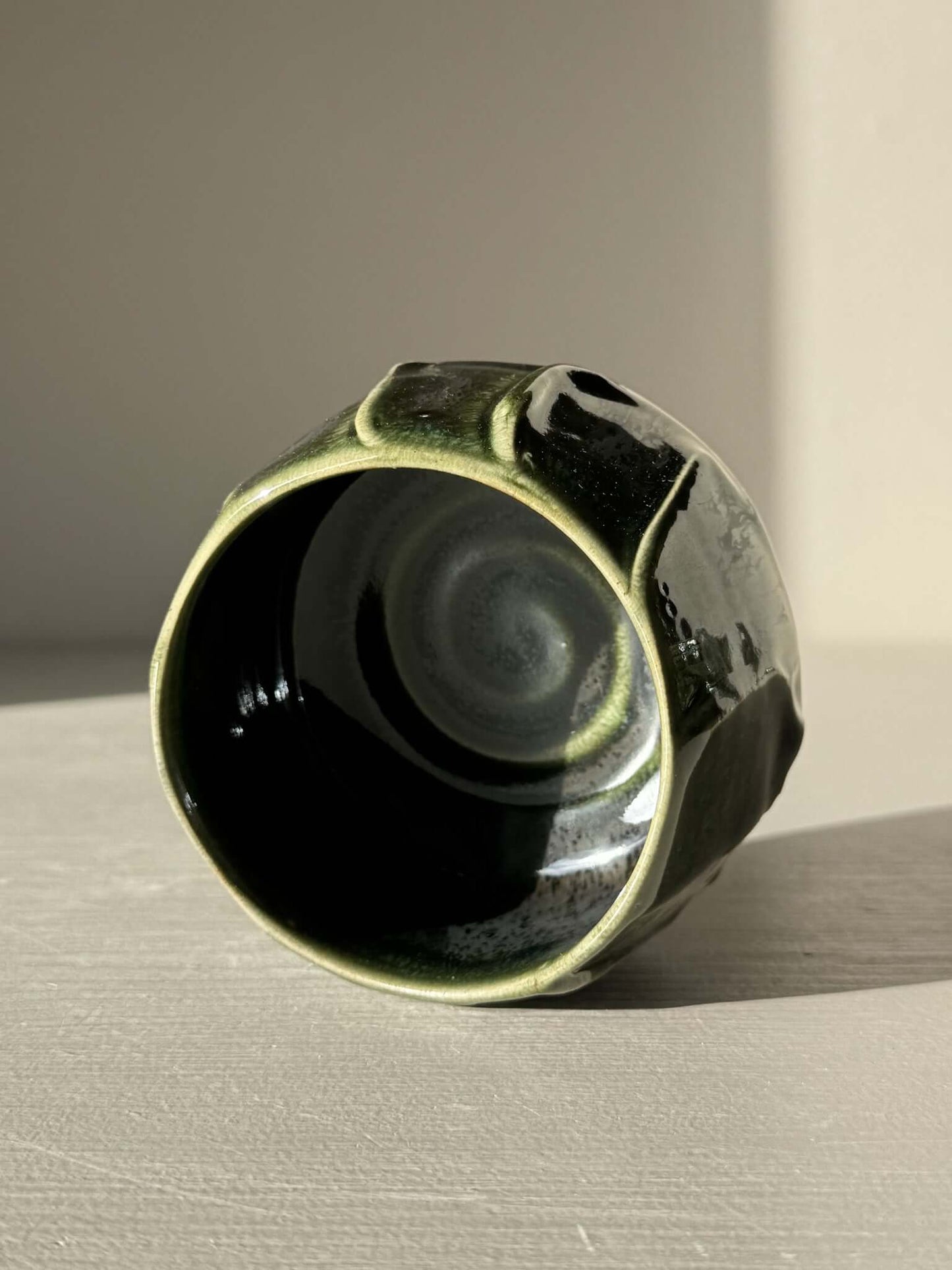 Yunomi Cup - Hinoki #29 with deep green glaze and unique slip texture, handcrafted for everyday tea moments. No two cups are alike.