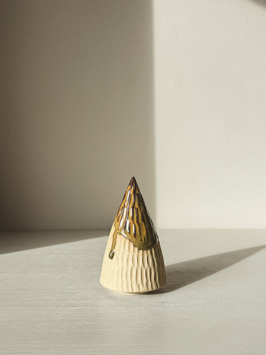 "Carved Ceramic Tree – Inyo #02 with glossy tenmoku glaze, showcasing hand-carved textures and minimalistic design in sunlight."