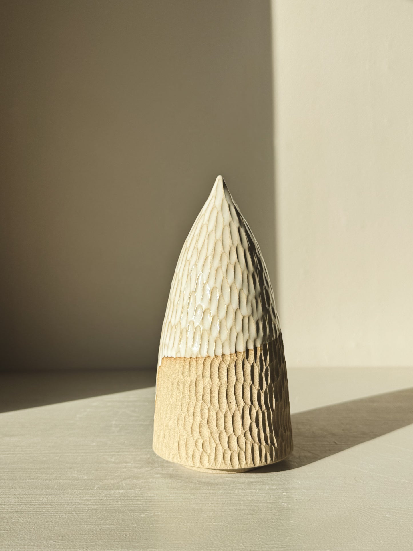 Carved Ceramic Tree – Yuki #03 with hand-carved texture and glossy white glaze on display.