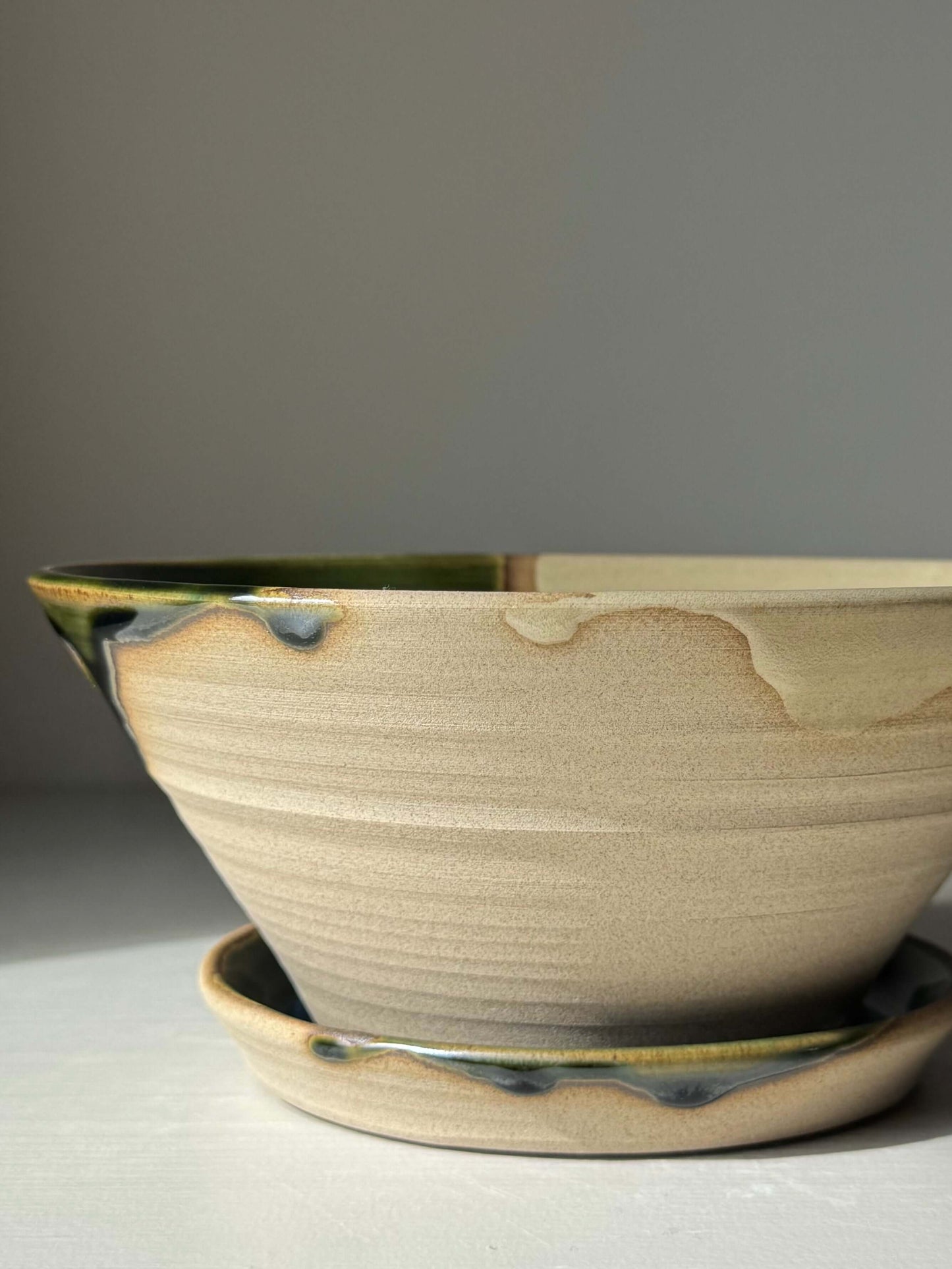 Handmade ceramic Berry Bowl - Mori Series with deep forest glaze, perfect for rinsing and serving fresh fruit; artisanal craftsmanship.