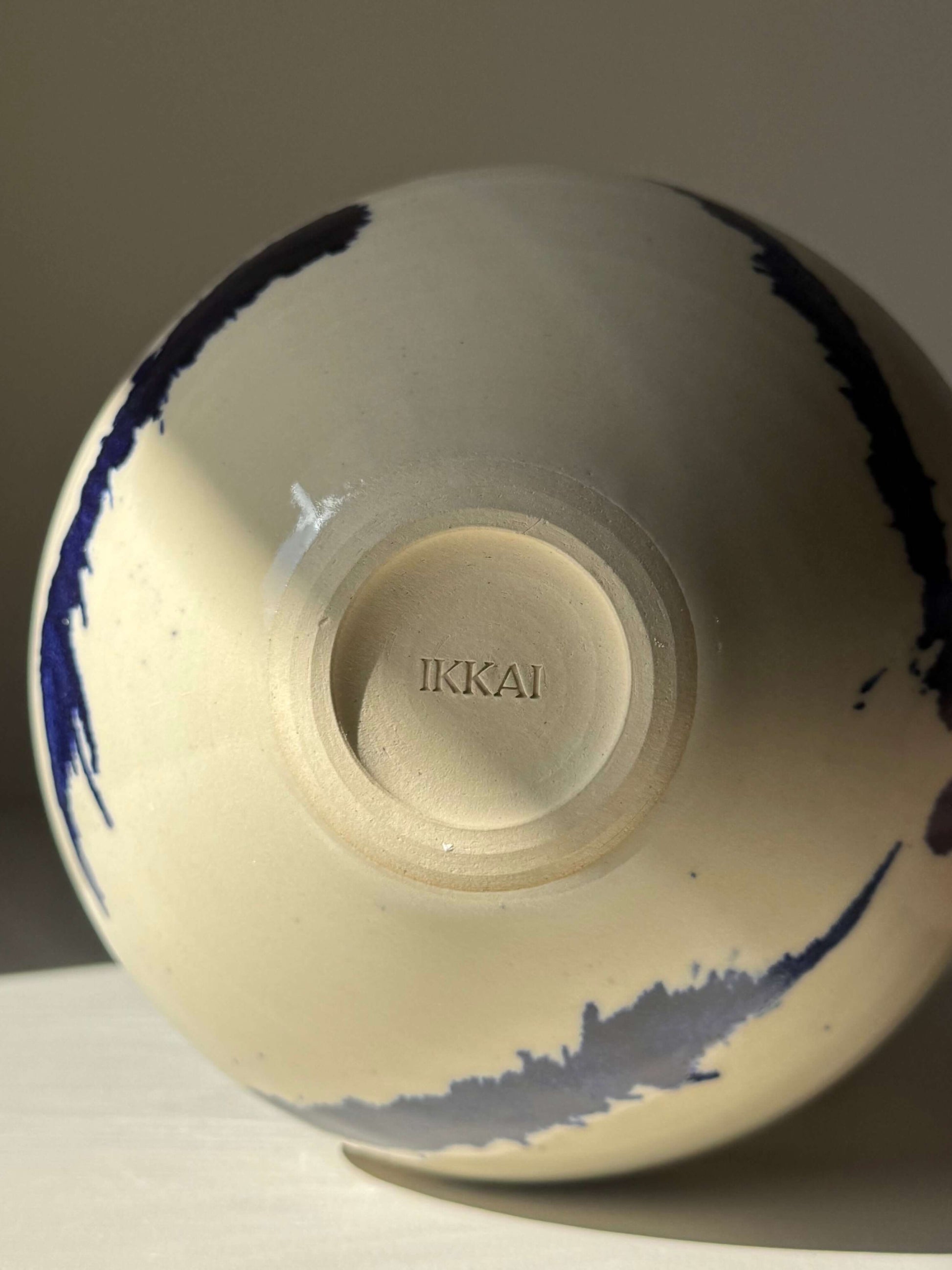Bottom view of handmade ceramic Bowls – Gosu with cobalt blue splashes on a soft glaze.