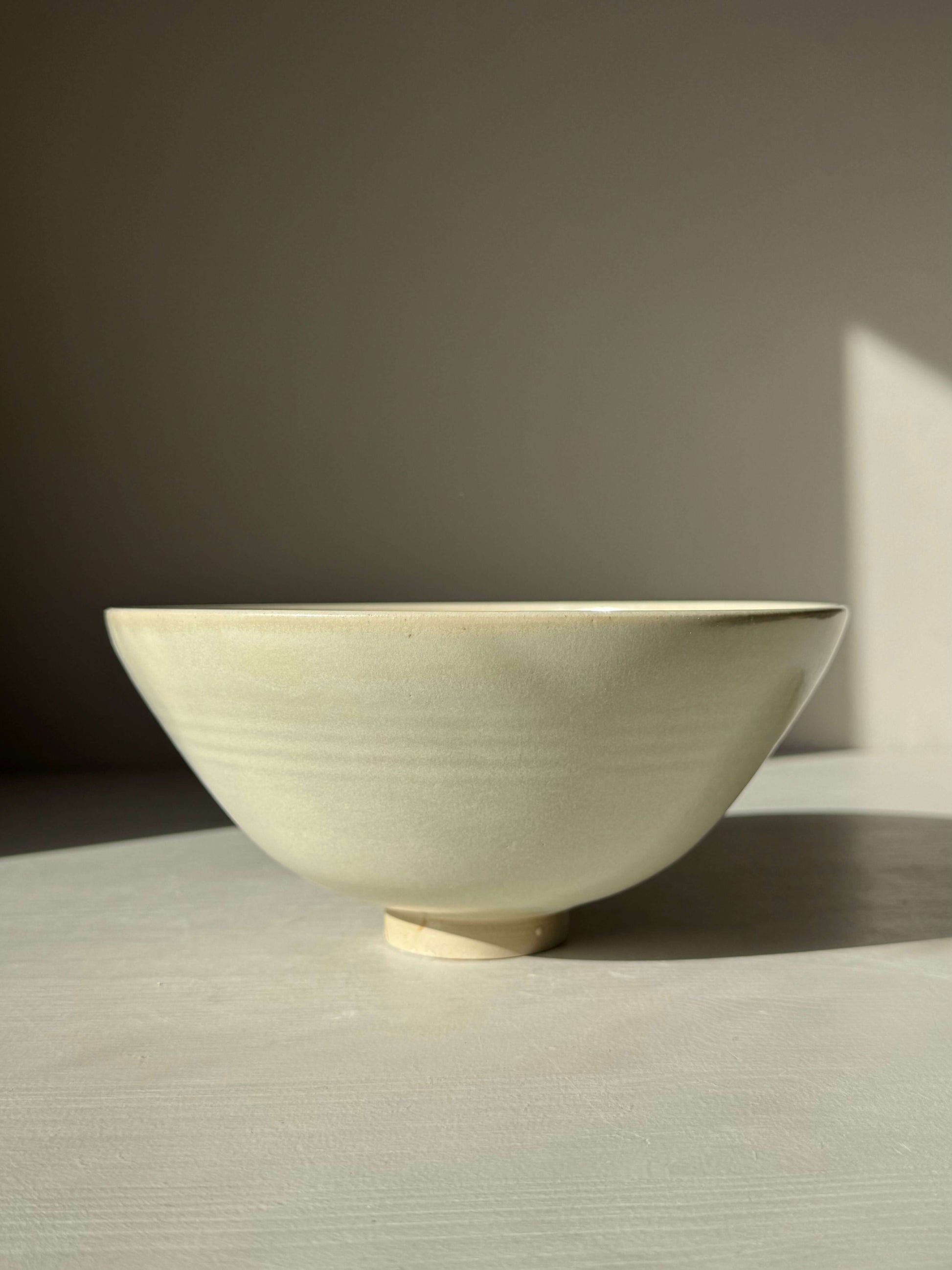 Bowl - Moonstone #02 handcrafted ceramic with moonstone glaze, features a rounded form and raised foot, calming and timeless design.