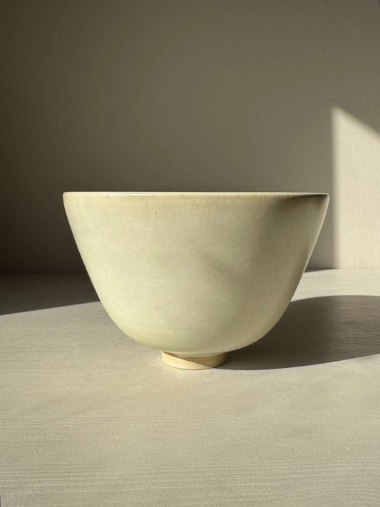 Bowl - Moonstone #01 in soft moonstone glaze, handmade ceramic with tall rounded form and raised foot, showcasing calming beauty.