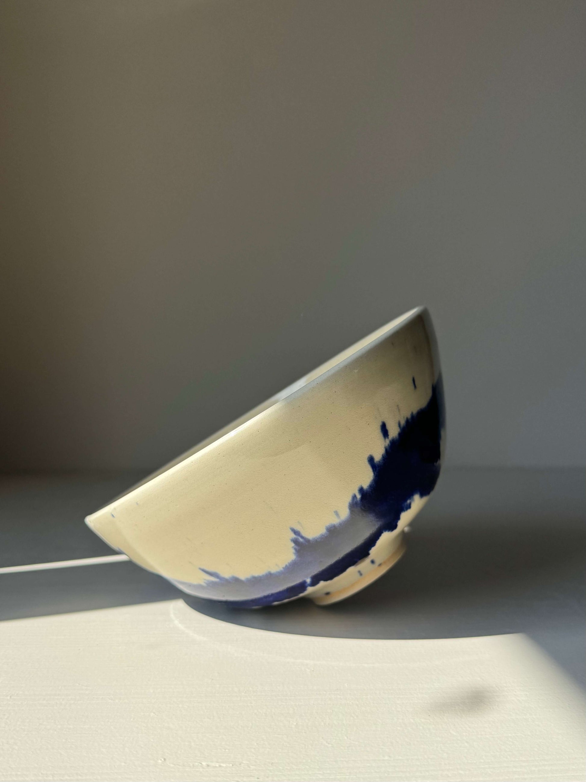 Handmade ceramic Breakfast Bowl – Gosu Series #02 with bold cobalt design on display.