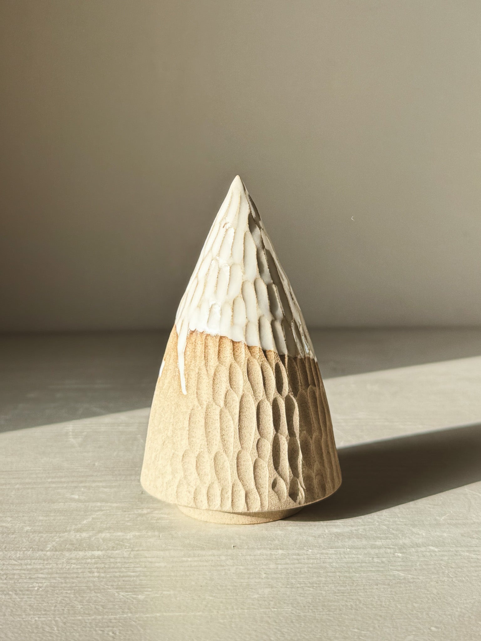 Carved Ceramic Tree – Yuki #01 with glossy white glaze, showcasing hand-carved patterns in soft light, perfect for minimal decor.