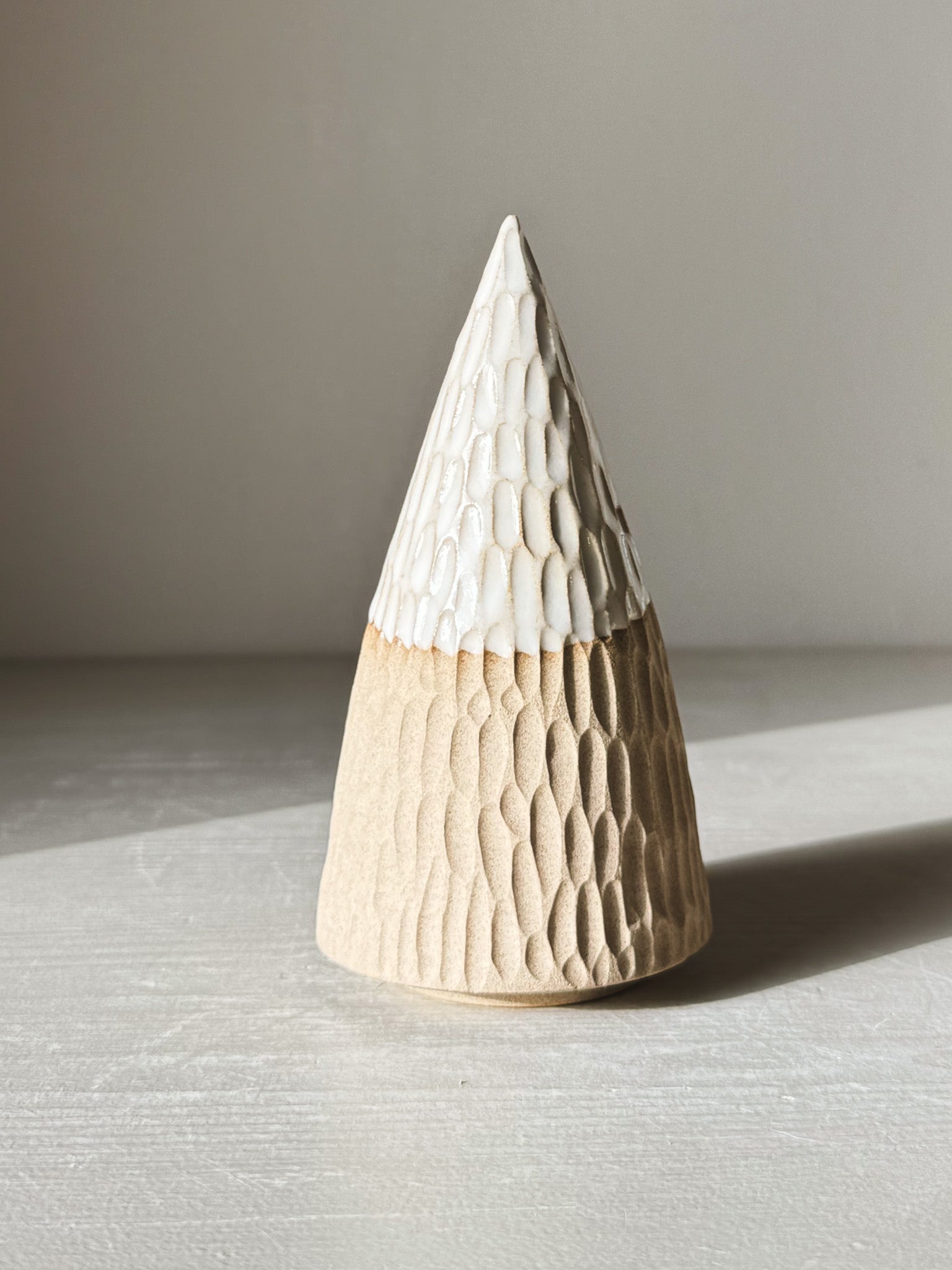 Carved Ceramic Tree – Yuki #02 in soft light, showcasing intricate hand-carved patterns and white glaze for minimalist decor.