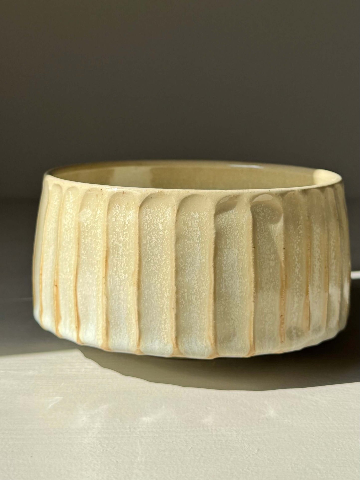 Handmade ceramic Carved Matcha Bowl – Moonstone Glaze #01 with intricate hand-cut grooves in pale moonstone finish.