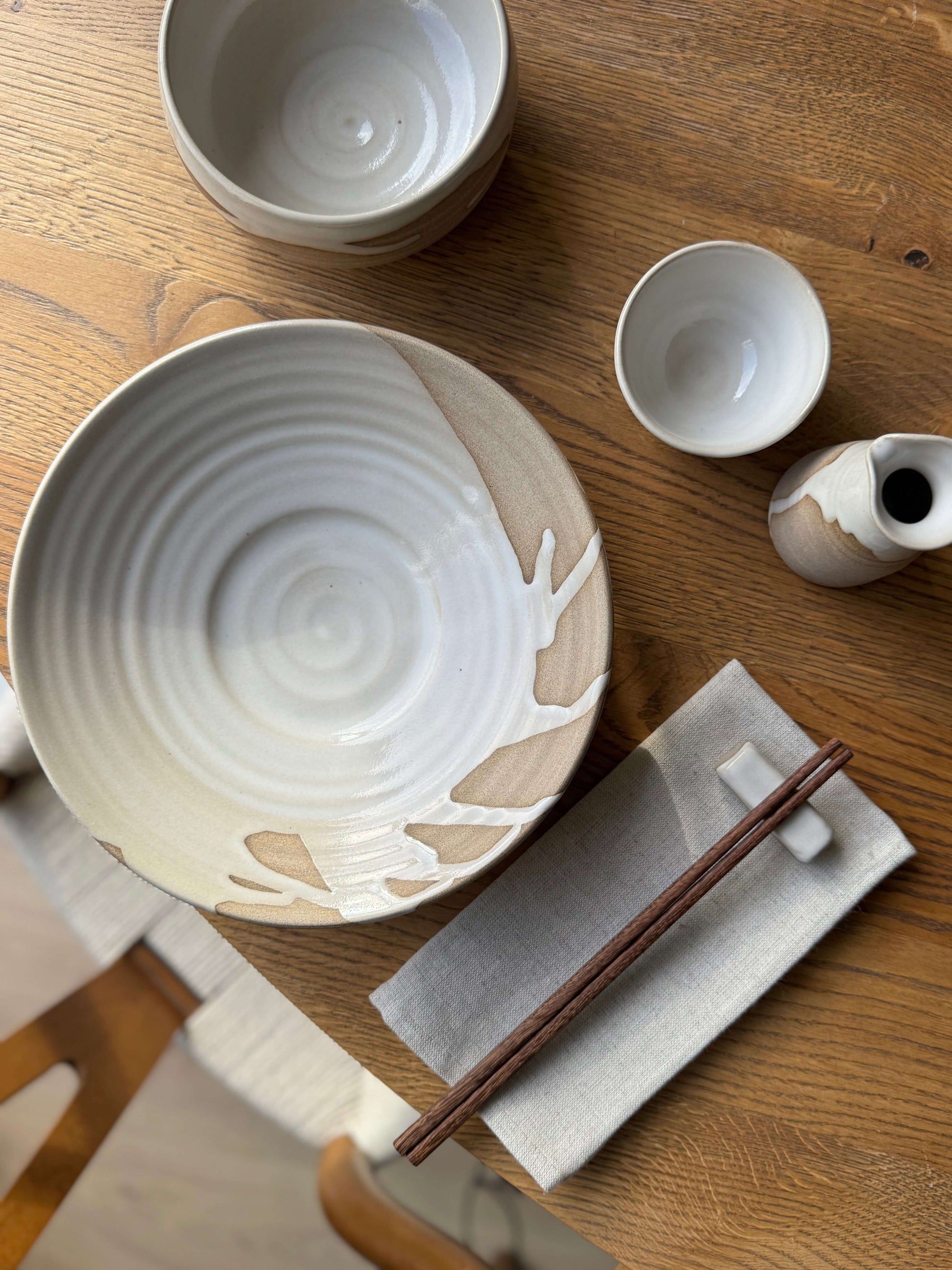 Chopstick/Spoon Rest – Yuki in handmade ceramic design, featuring a white glaze over toffee clay, perfect for dining elegance.
