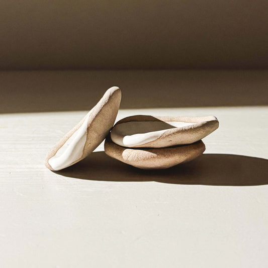 Organic Chopstick/Spoon Rest – Yuki, handmade ceramics with white glaze and raw clay, perfect pottery for table or tea settings.