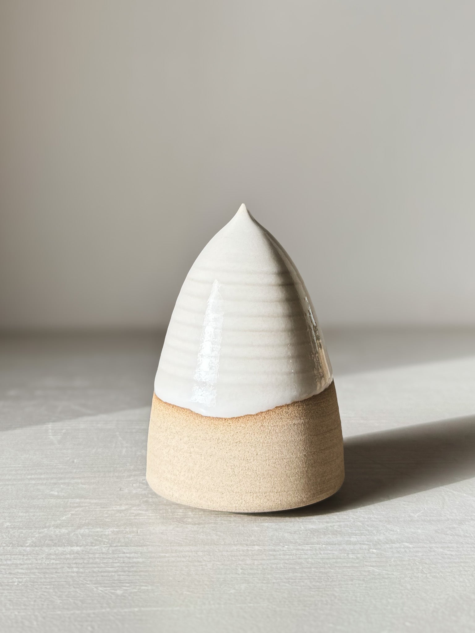 Ceramic Christmas Tree – Yuki #03 with glossy white glaze and minimal design on warm clay, handcrafted and wheel thrown.