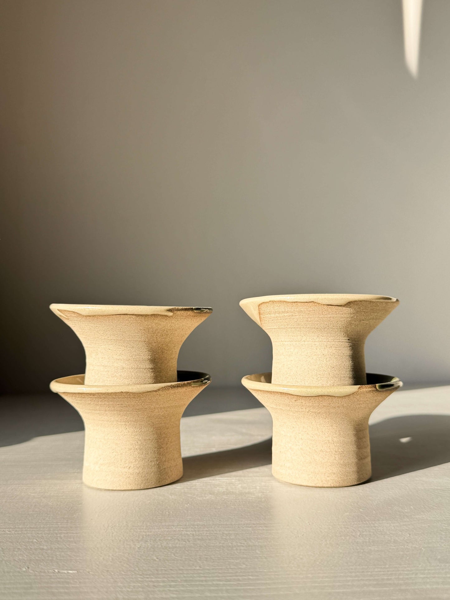 Handmade ceramic Egg Cup - Mori with soft green Mori glaze, showcasing earthy charm and functionality.