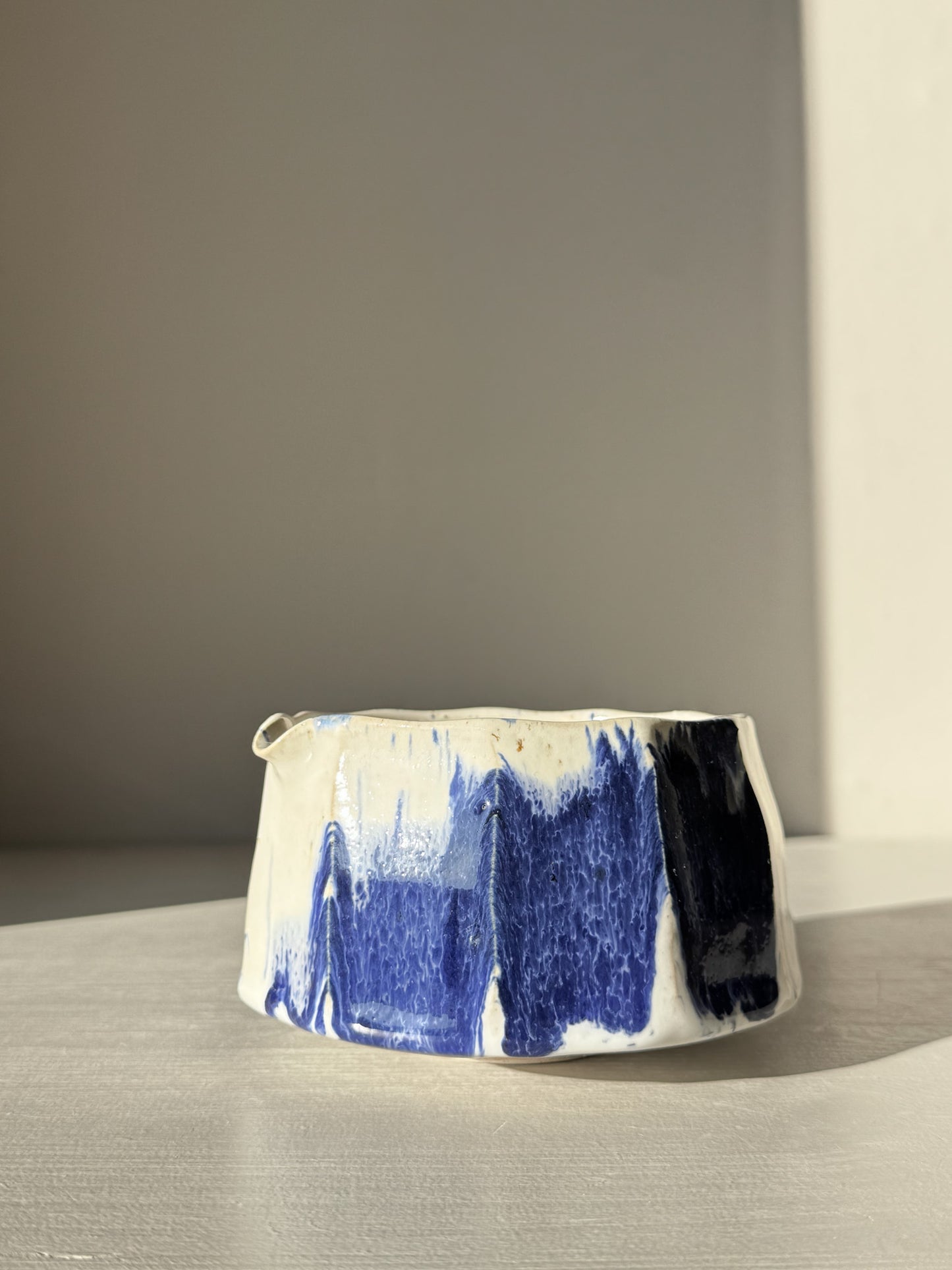 Faceted Matcha Bowl with Spout – White & Blue #01 featuring unique faceted design and cobalt blue hand-splashed accents