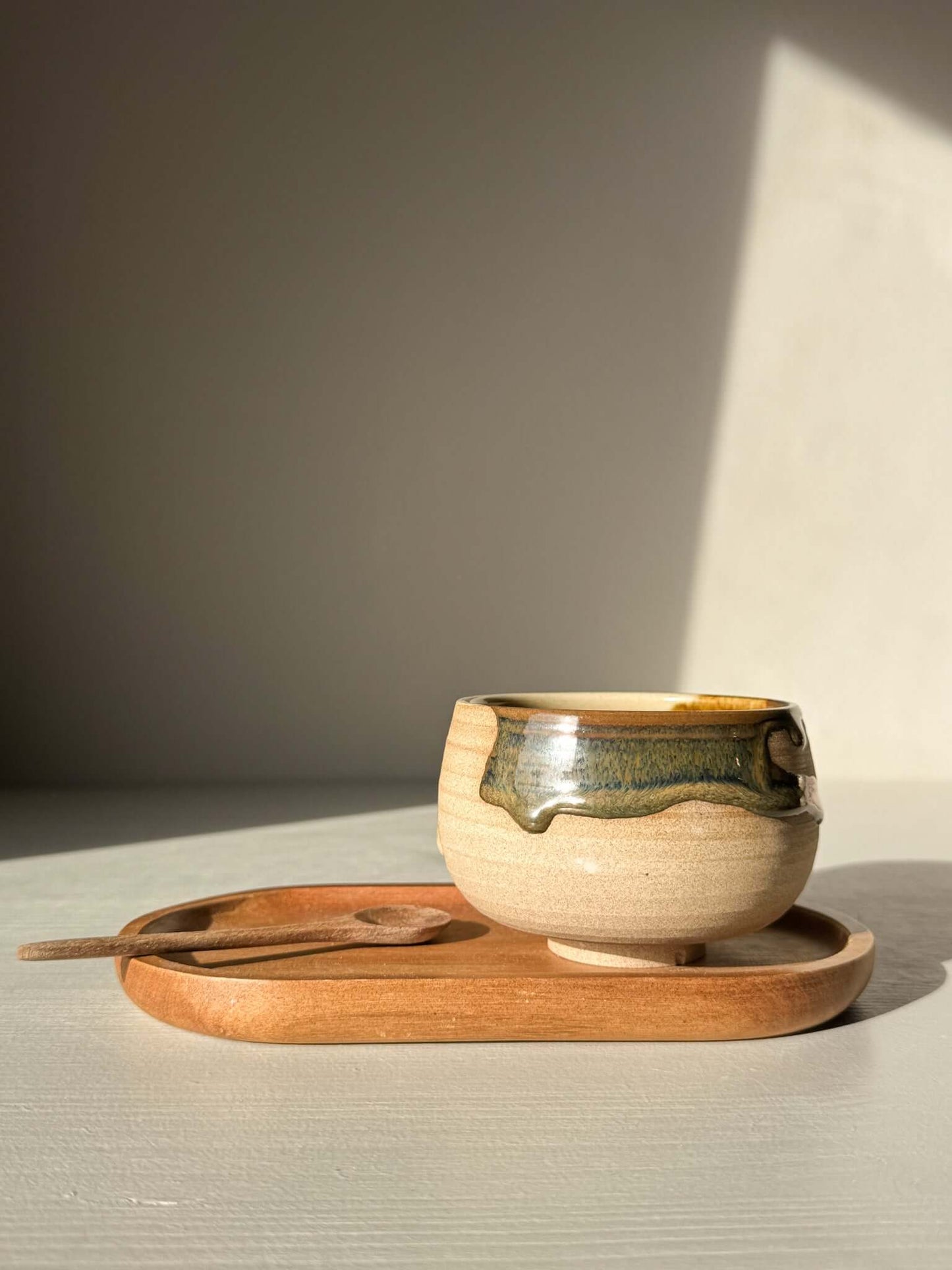 Coffee cups - Inyo handmade ceramic with unique glazing on wooden tray in soft lighting