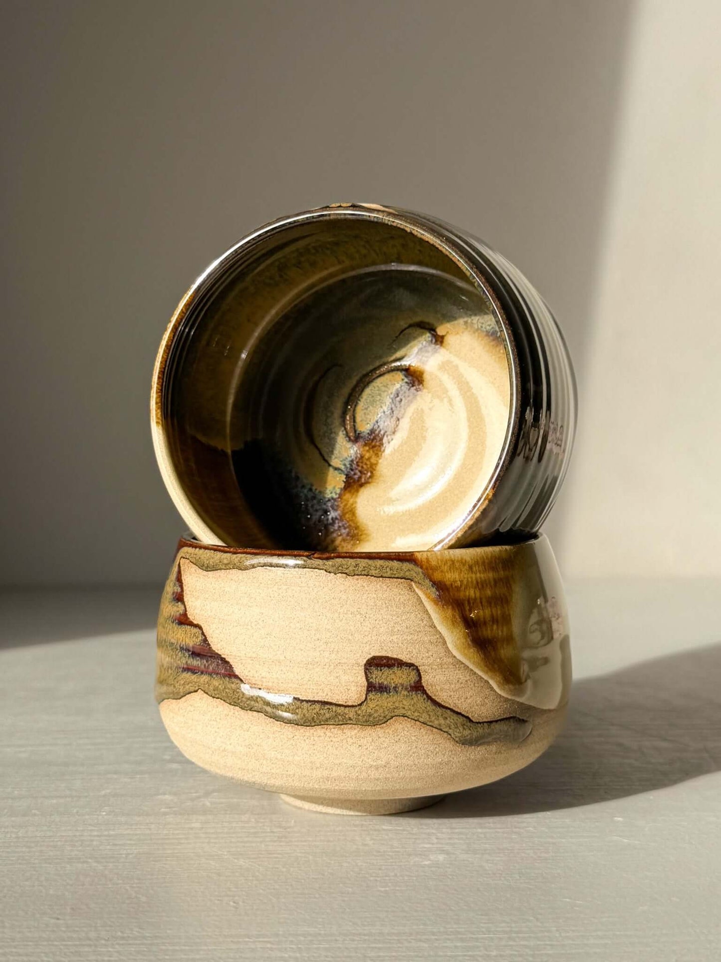 Handmade ceramic Coffee cups - Inyo with contrasting tenmoku and clear glazes.