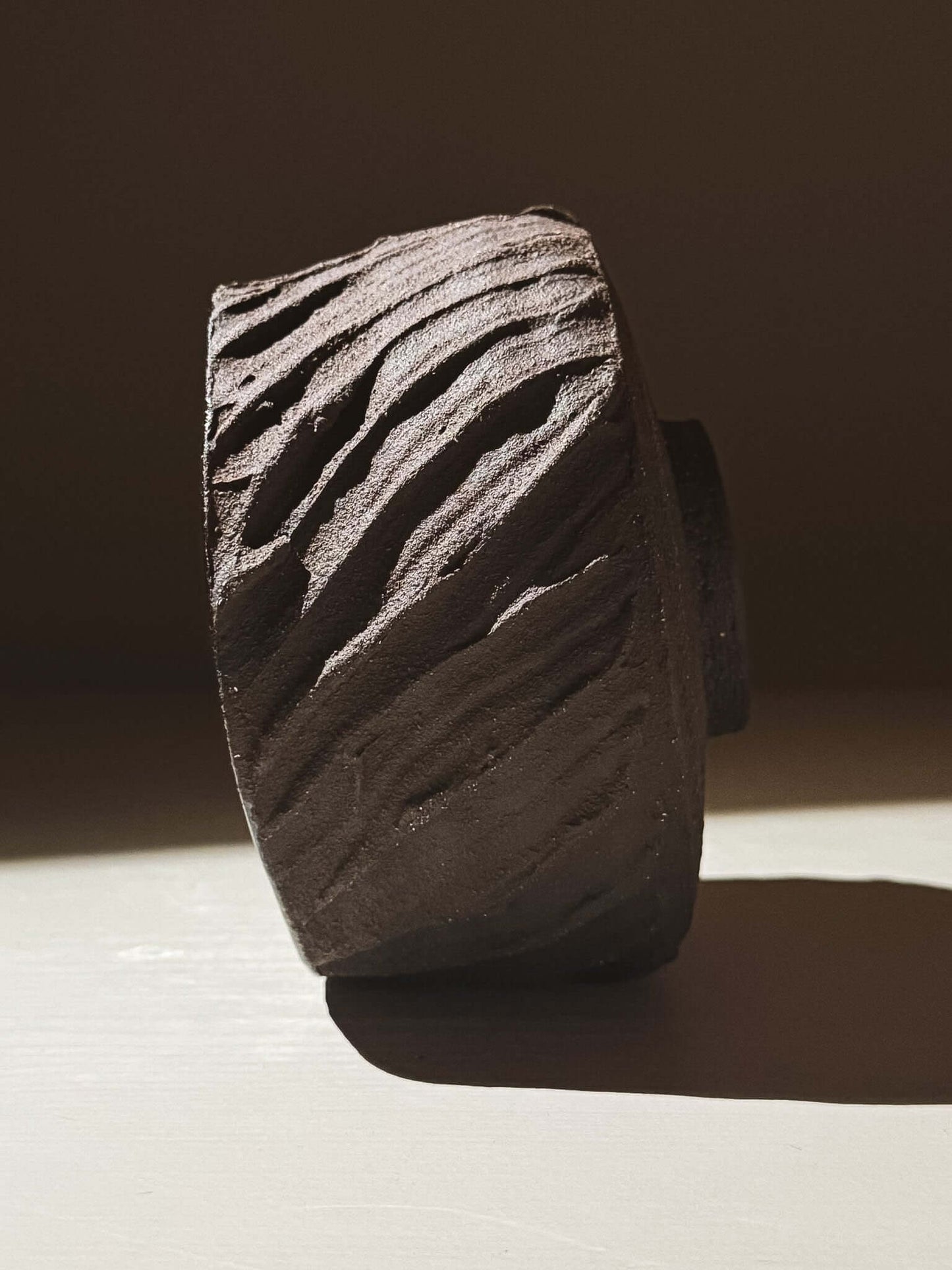 Kuro Matcha Bowl #04 with textured dark brown slip exterior and glossy dark glaze interior