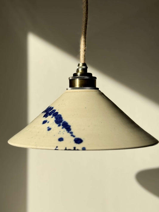 Handmade ceramic lamp shade in soft transparant glaze, perfect for cozy home lighting