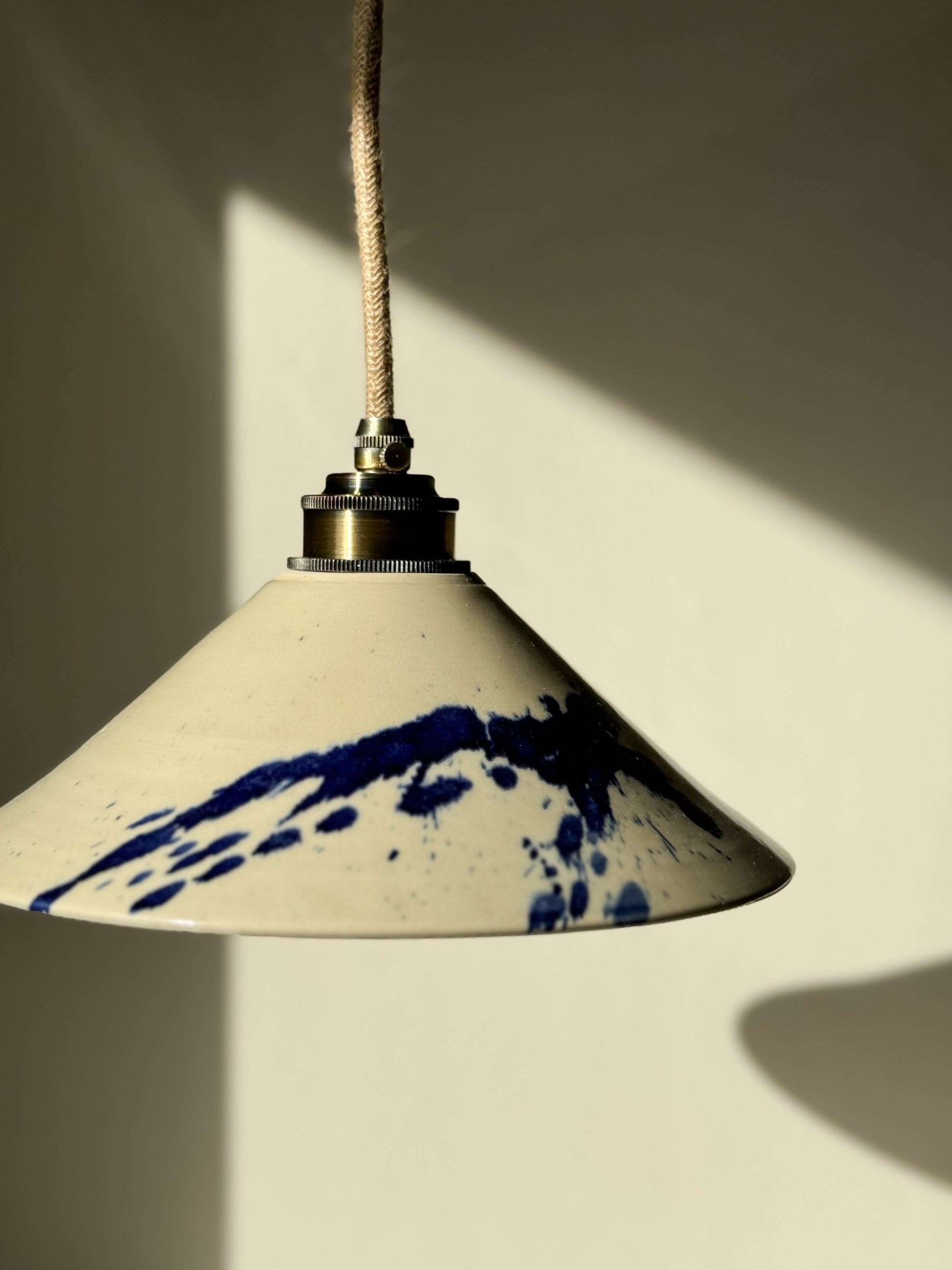 Handmade Gosu Series ceramic lamp shade with cobalt blue splashes, featuring unique design and glossy finish.