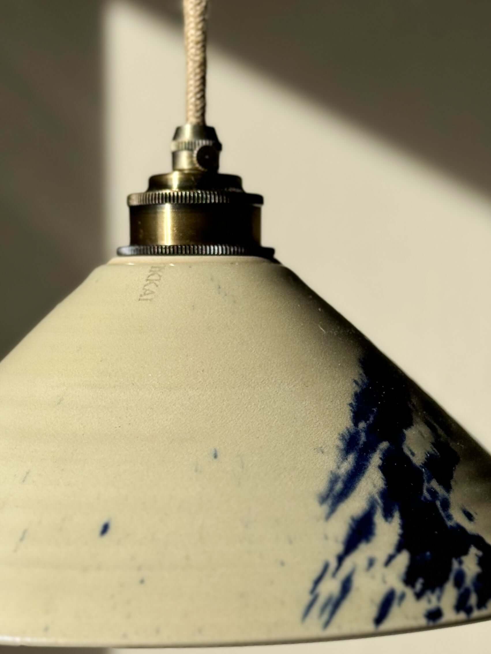 Handmade ceramic lamp shade from Gosu Series #05 with cobalt blue accents.
