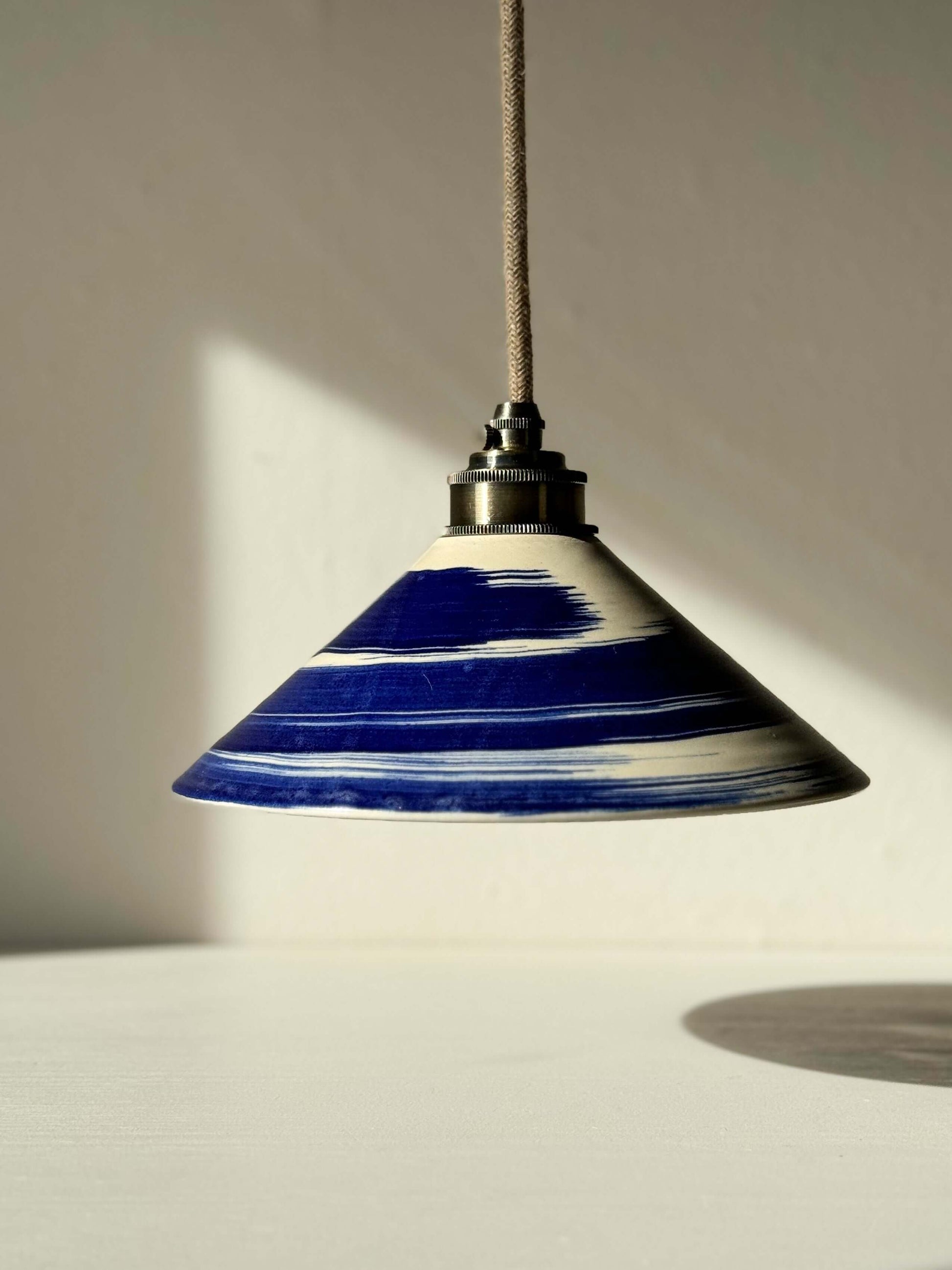 Gosu Series #07 handmade ceramic lamp shade with cobalt blue brush accents and glossy finish.