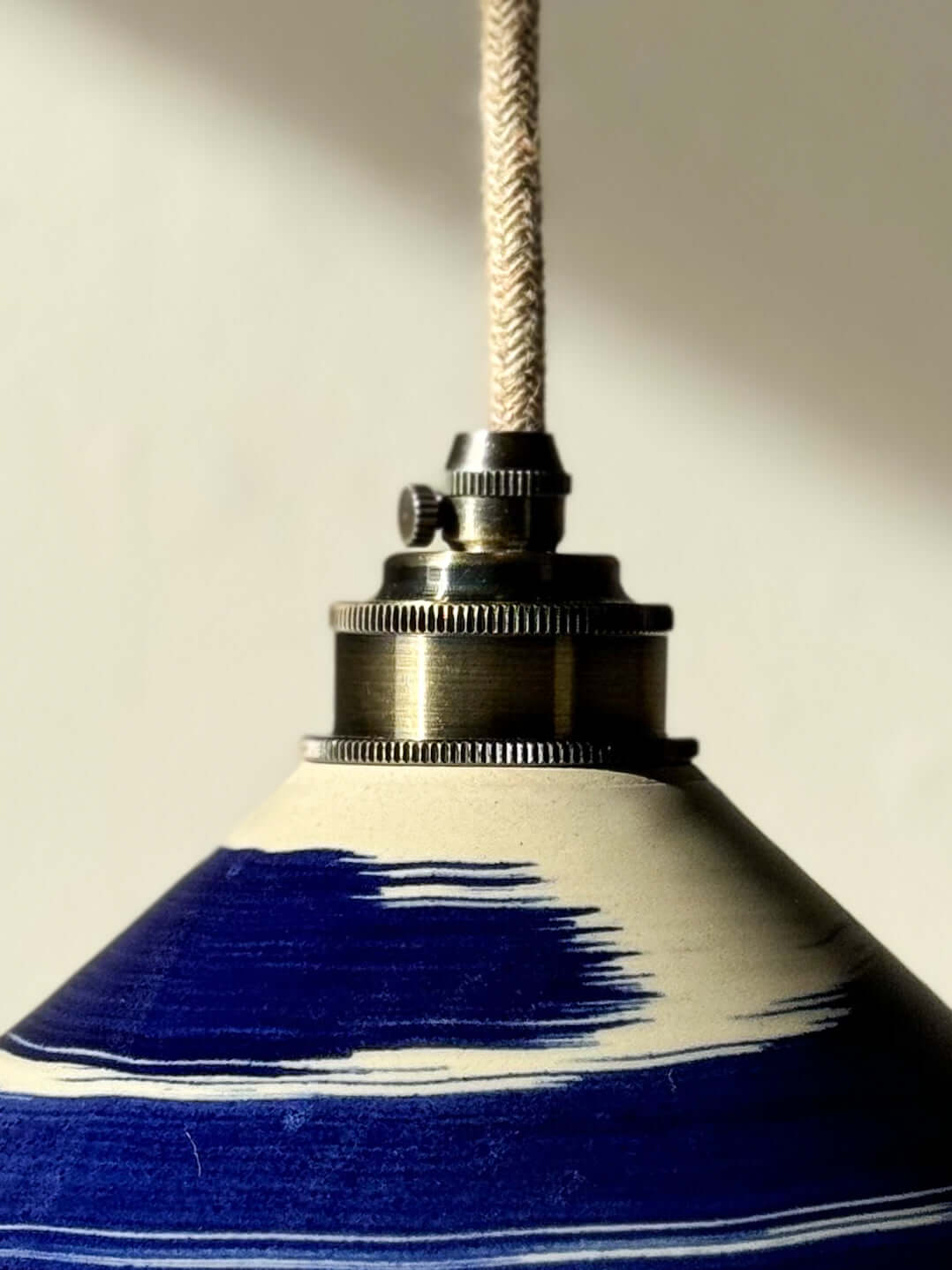 Handmade ceramic lamp shade from Gosu Series with cobalt blue accents and glossy finish.