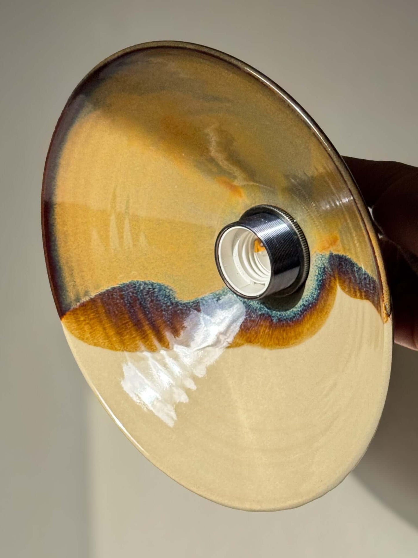 Handmade Ceramic Lamp Shade – Inyo #02 with glossy glaze and bronze, amber tones.