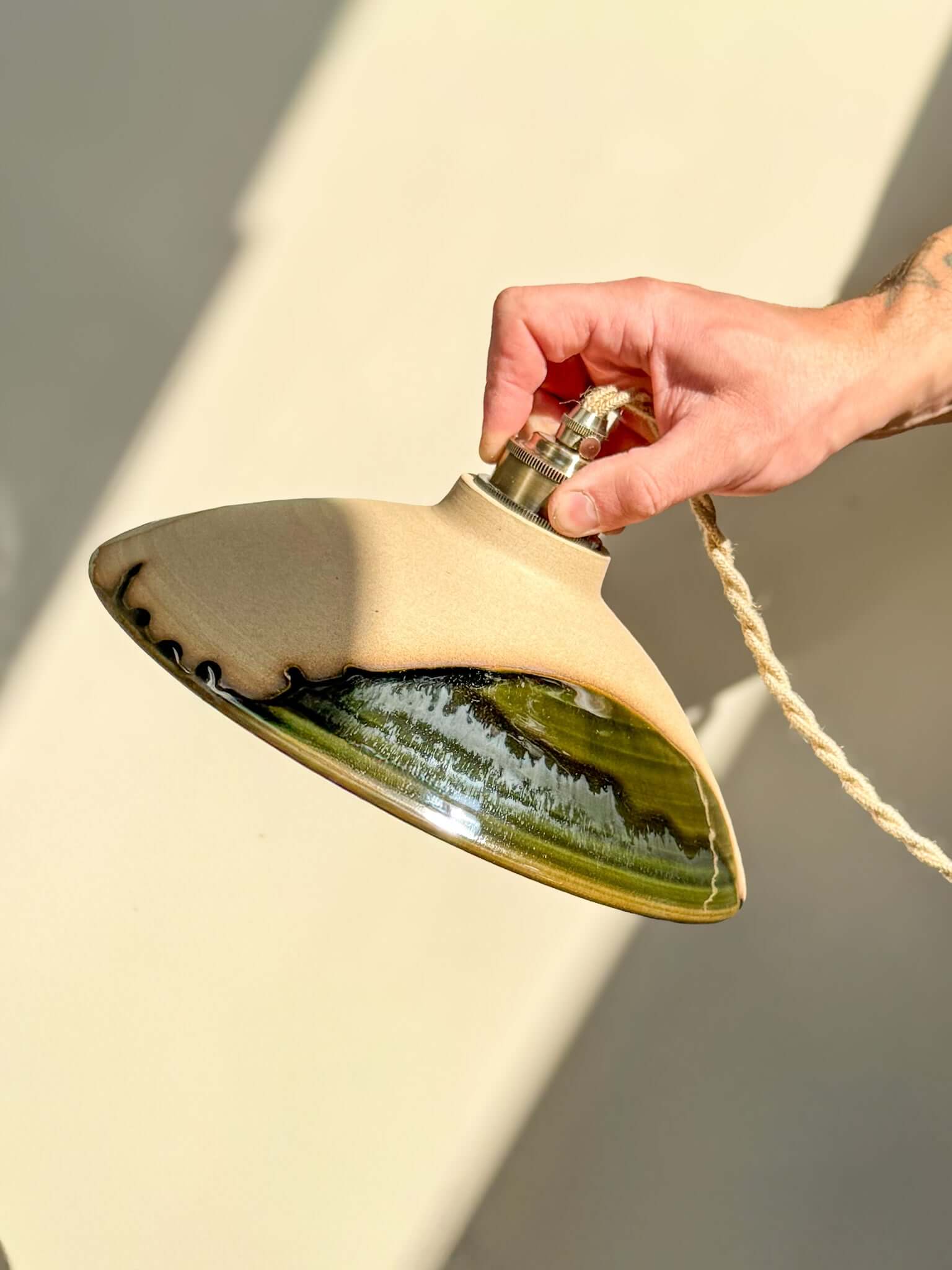 Ceramic Lamp Shade – Mori #02 Custom Order with forest green glaze and raw clay texture in natural light.