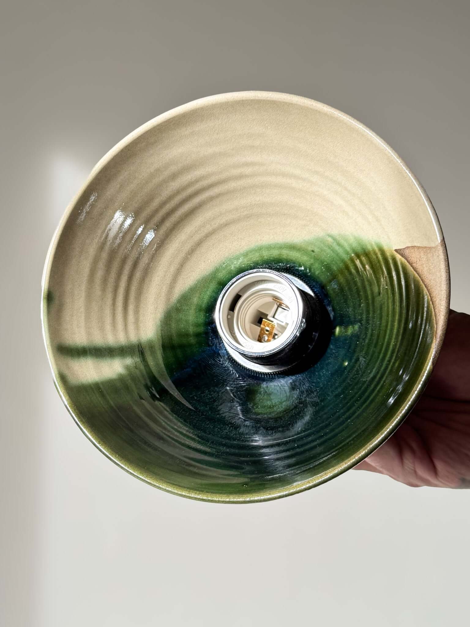 Handmade Ceramic Lamp Shade – Mori #01 showcasing natural tones and forest green glaze with raw tactile finish.