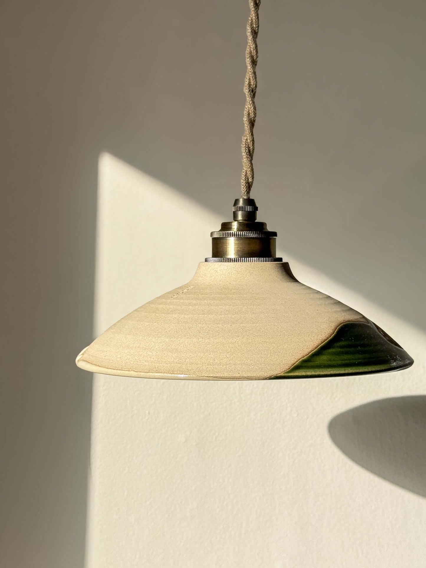 Ceramic Lamp Shade – Mori #02 featuring handmade ceramic with forest green glaze and natural tones, showing raw tactile clay texture.