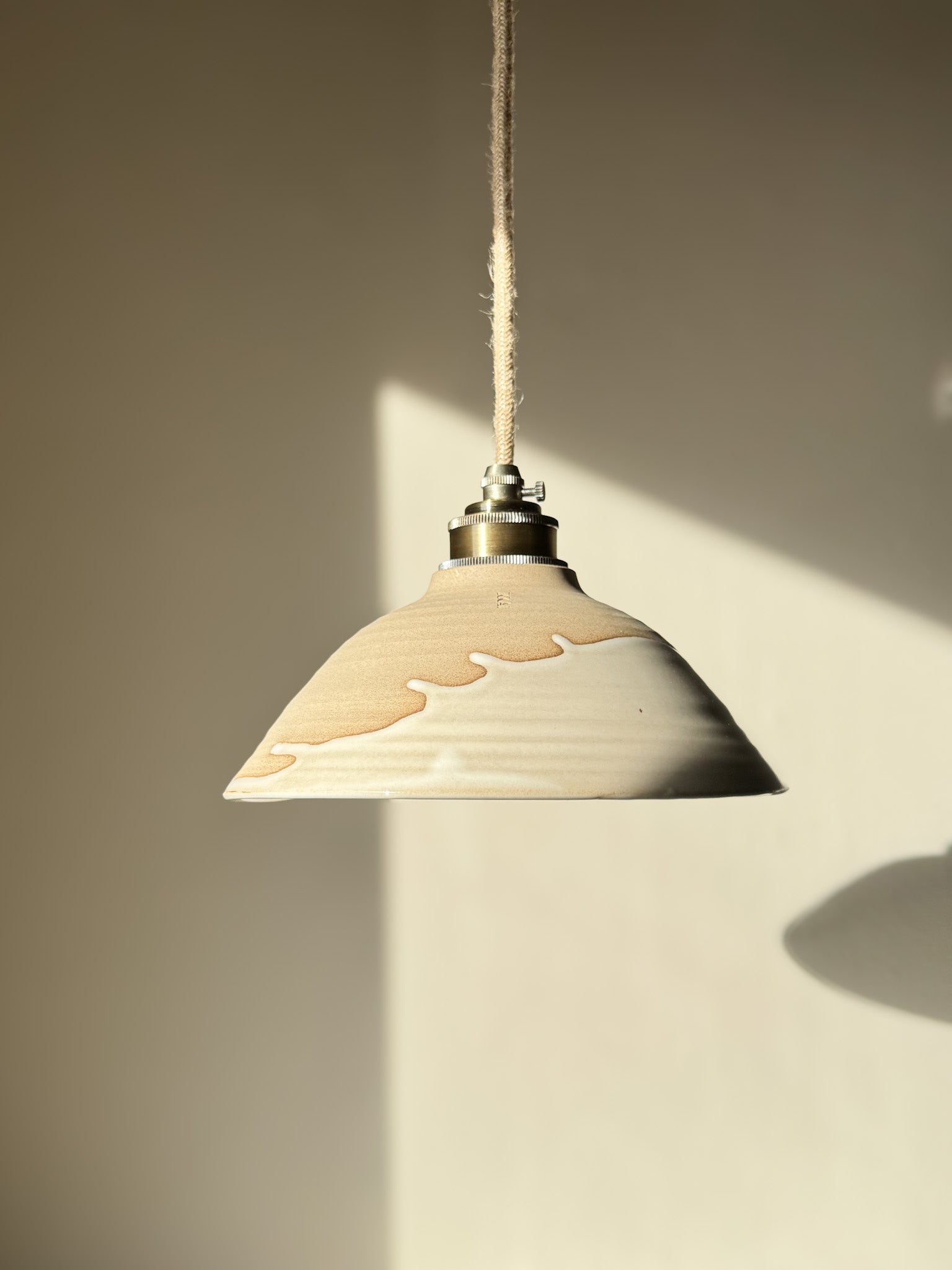 Ceramic Lamp Shade – Yuki #02 with glossy white glaze and warm raw clay design, featuring a creamy drip and organic slanted profile.