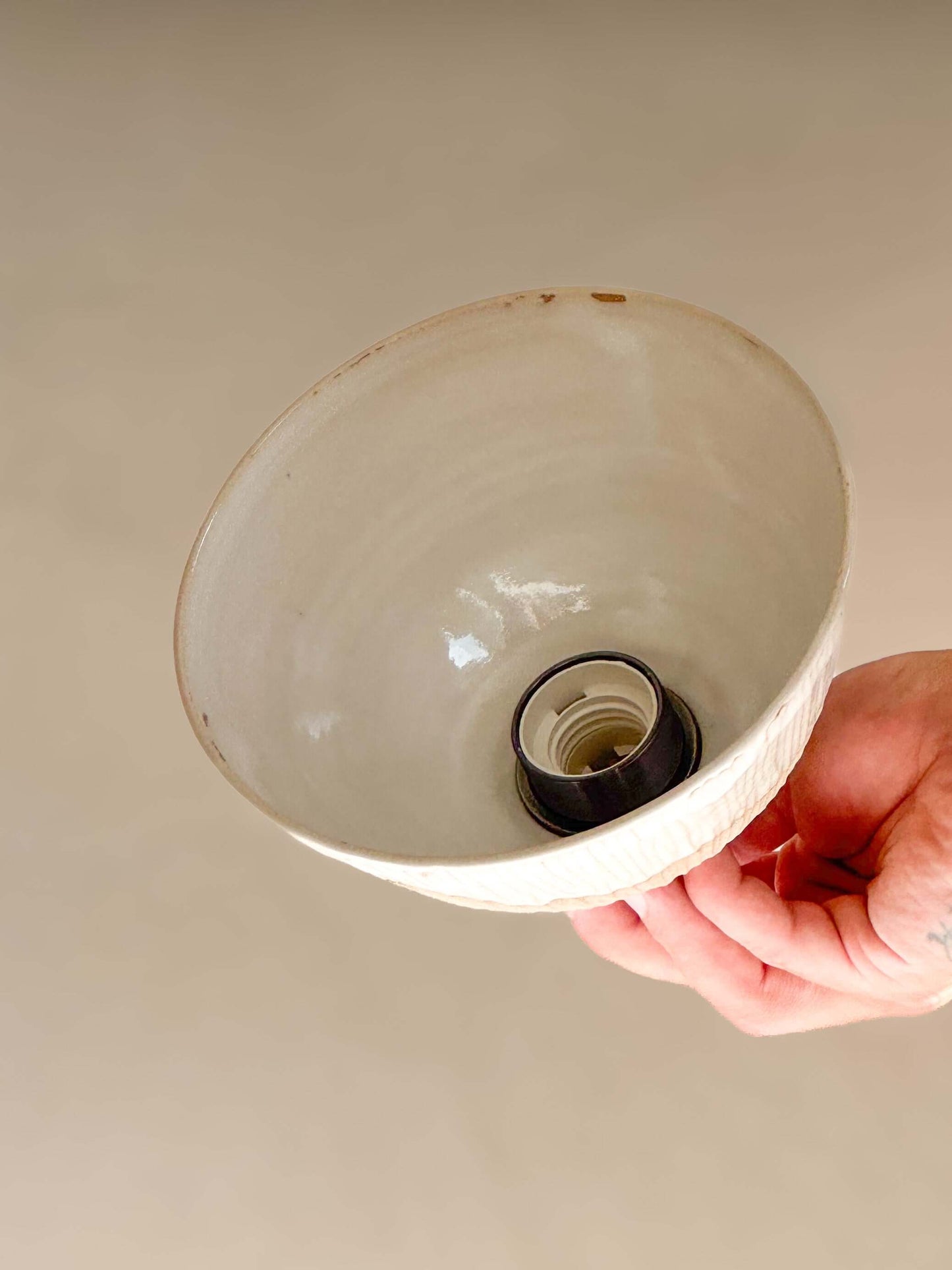 Handmade Ceramic Lamp Shade – Yuki Series with white glaze and carved ridges, featuring a mix of matte and glossy surfaces.