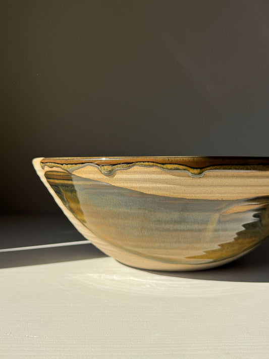 Handmade ceramic Large Bowl - Inyo #01 with glossy tenmoku and clear glazes, showcasing flowing contrasts.