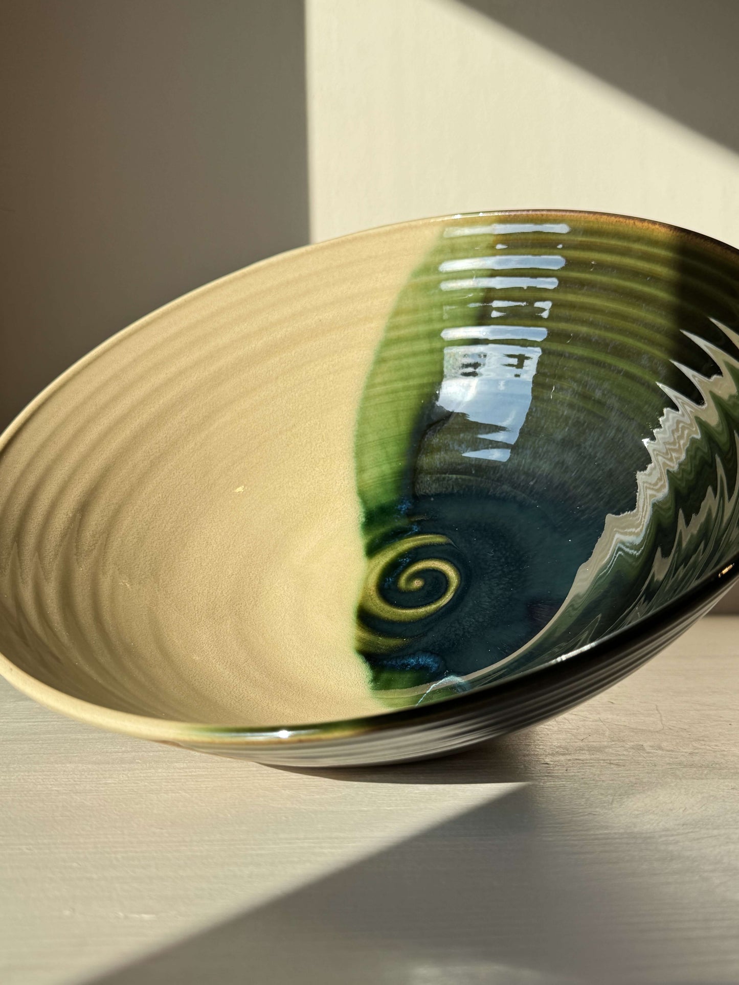 Large Bowl - Mori #02; handmade ceramic with glossy green glaze and swirling emerald tones, capturing the essence of sunlight in forest leaves.