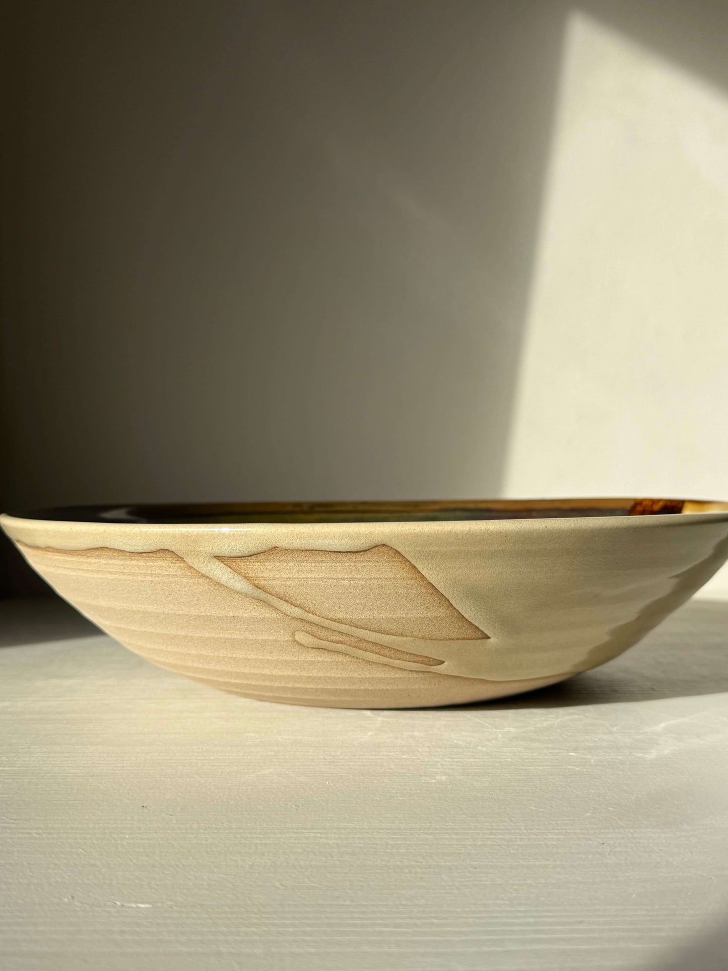Handmade ceramic Large Shallow Bowl - Inyo #01 with textured carved rim and unique glaze finish, approx. 31.5 cm diameter.