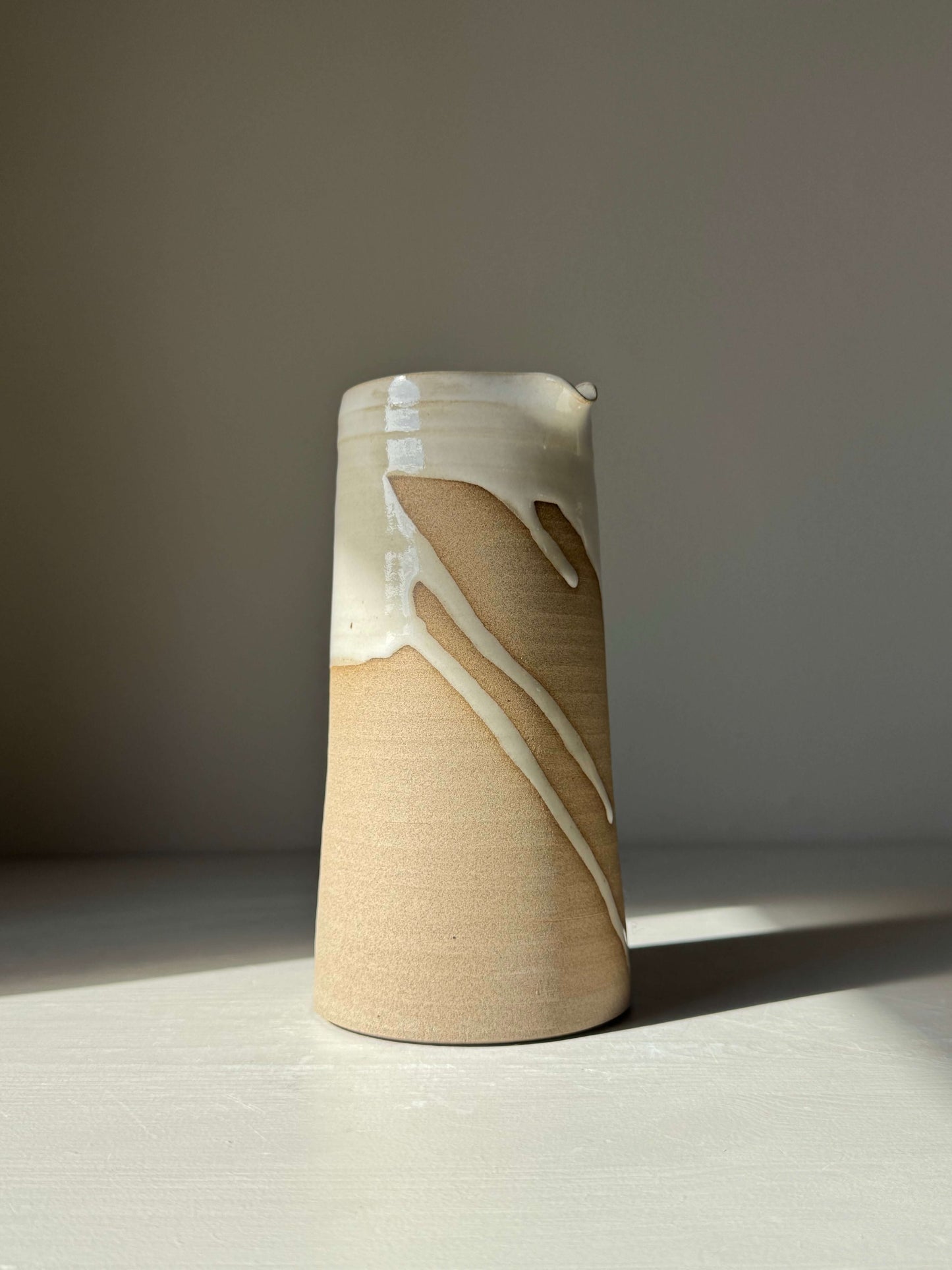 Handmade ceramic Large Vase / Jug – Yuki Series with a glossy white glaze and toffee-colored clay finish, showcasing elegant design.