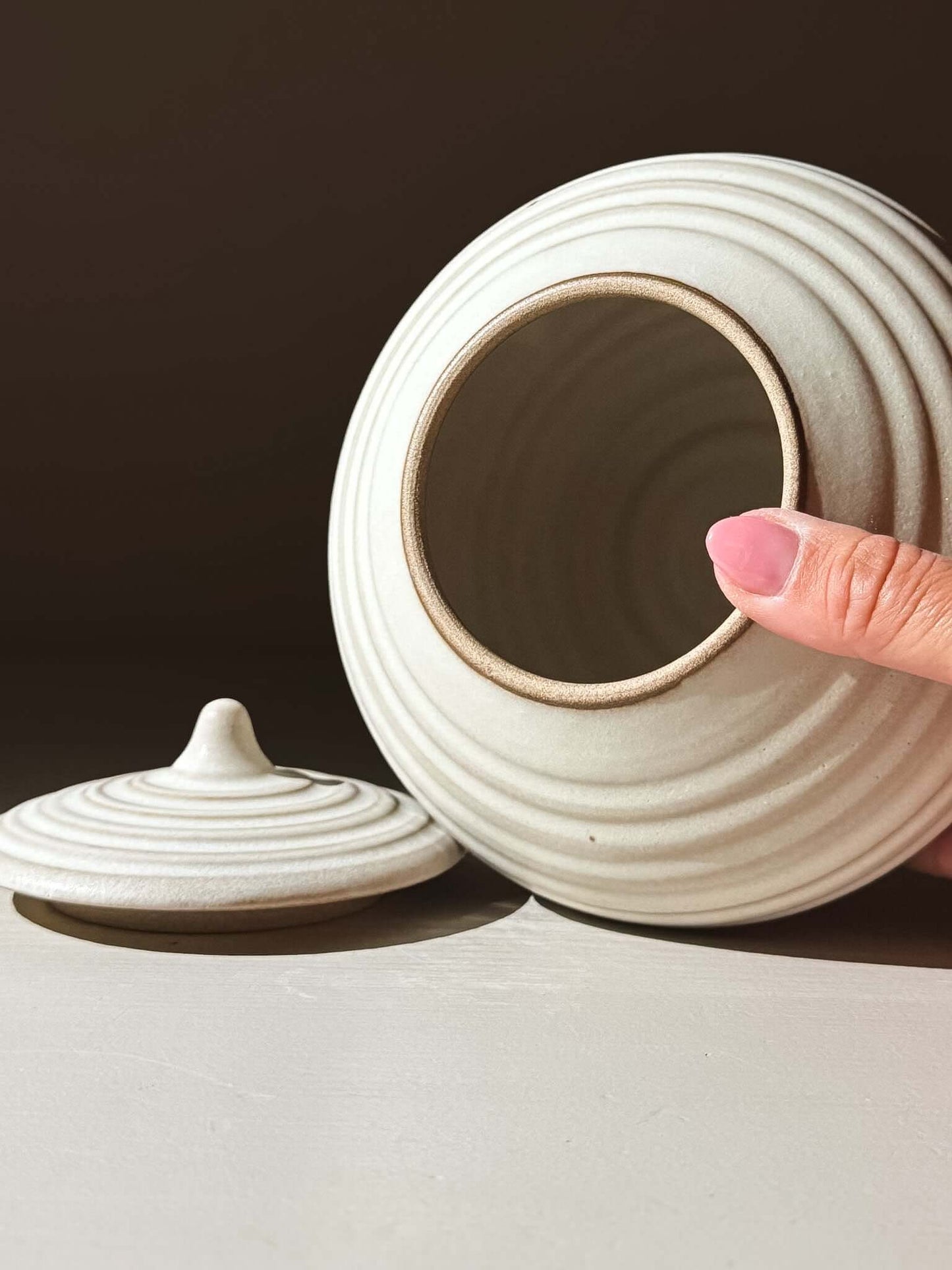 Handmade ceramic Lidded Jar - Eggshell #01 with lid removed, showcasing artisanal pottery craftsmanship.