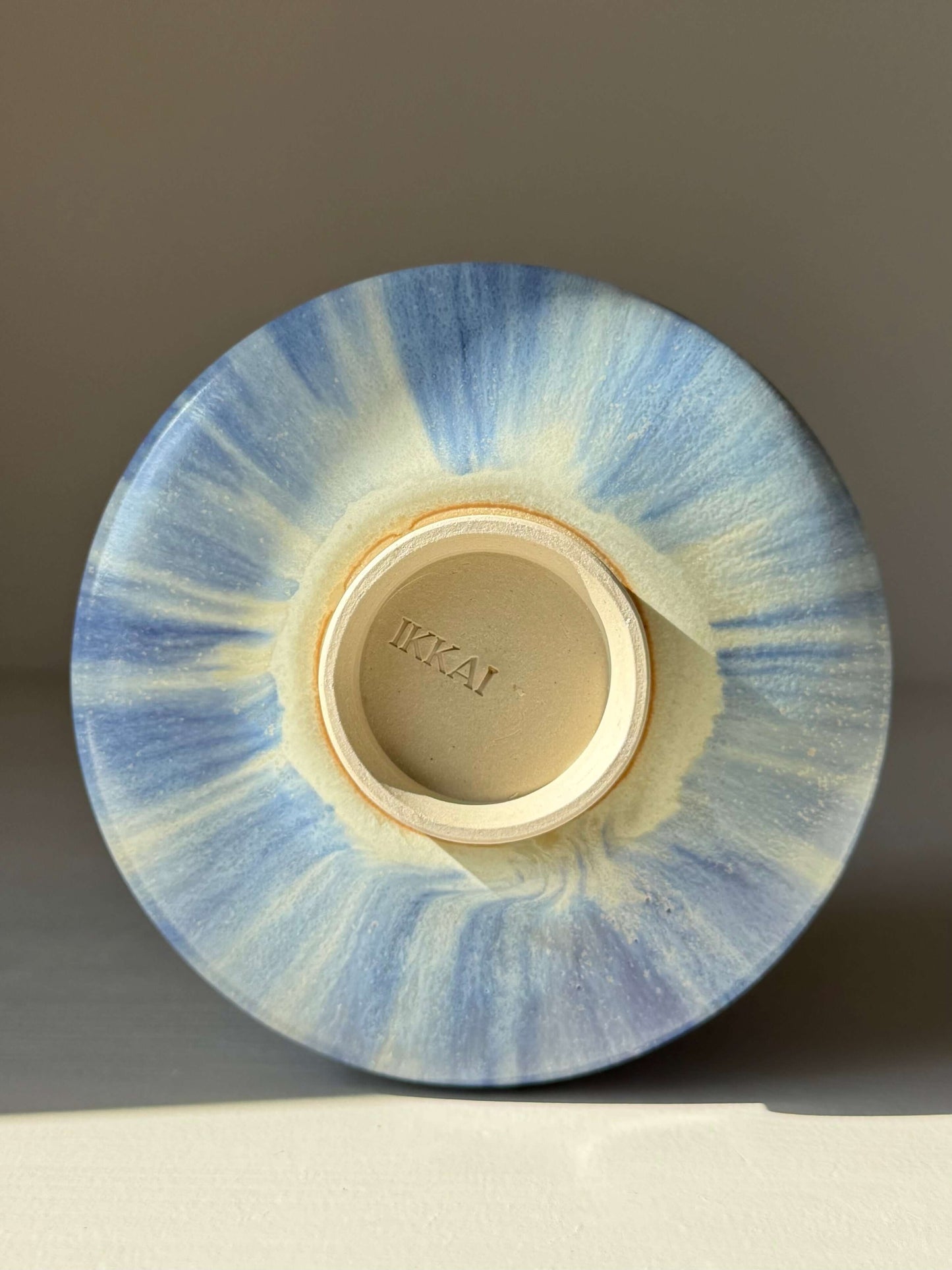 Base view of Matcha bowl - Cobalt Blue & Moonstone Glaze #05, handmade ceramic with unique layered glazes, showing maker's mark.