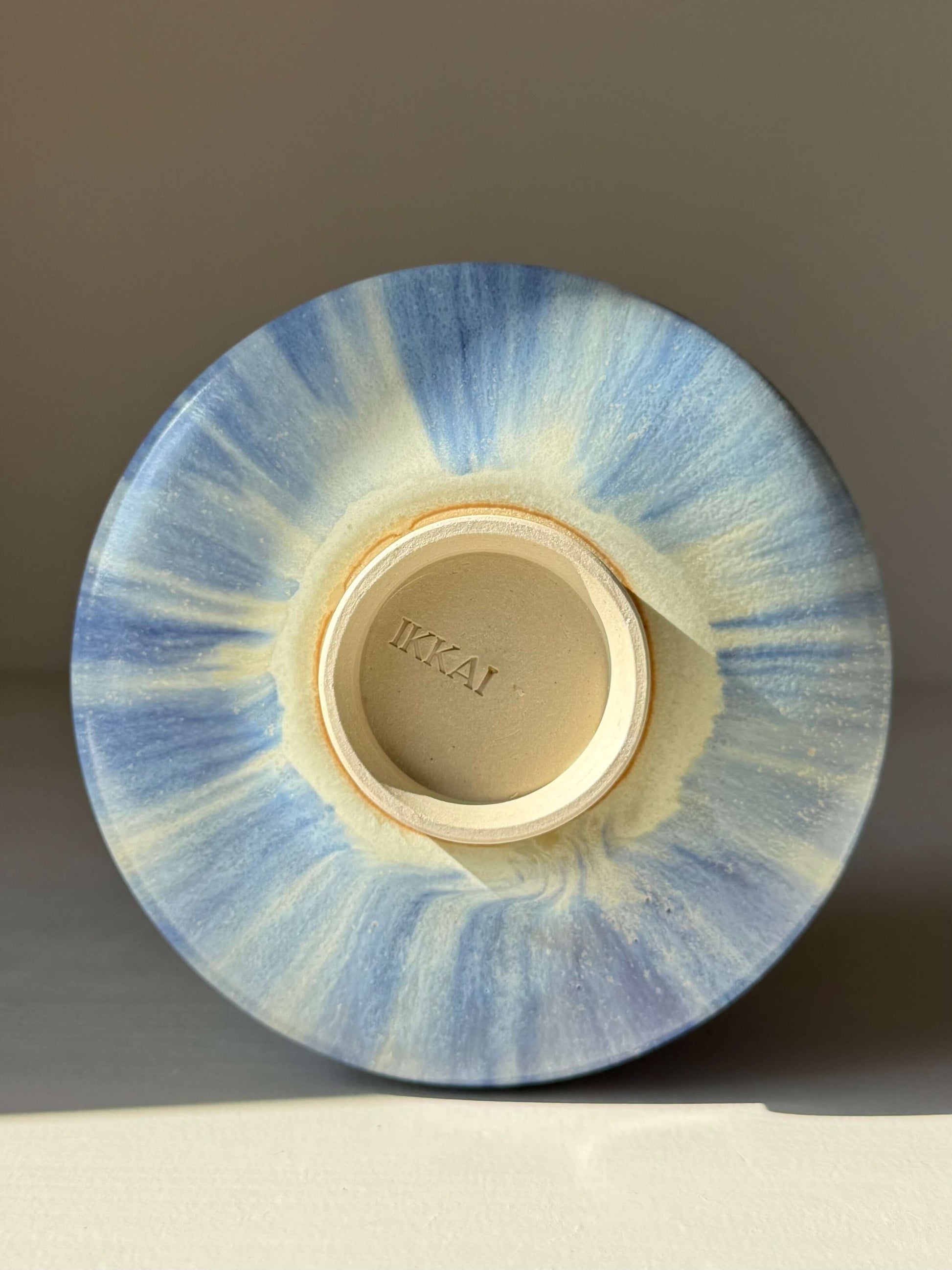 Base view of Matcha bowl - Cobalt Blue & Moonstone Glaze #05, handmade ceramic with unique layered glazes, showing maker's mark.