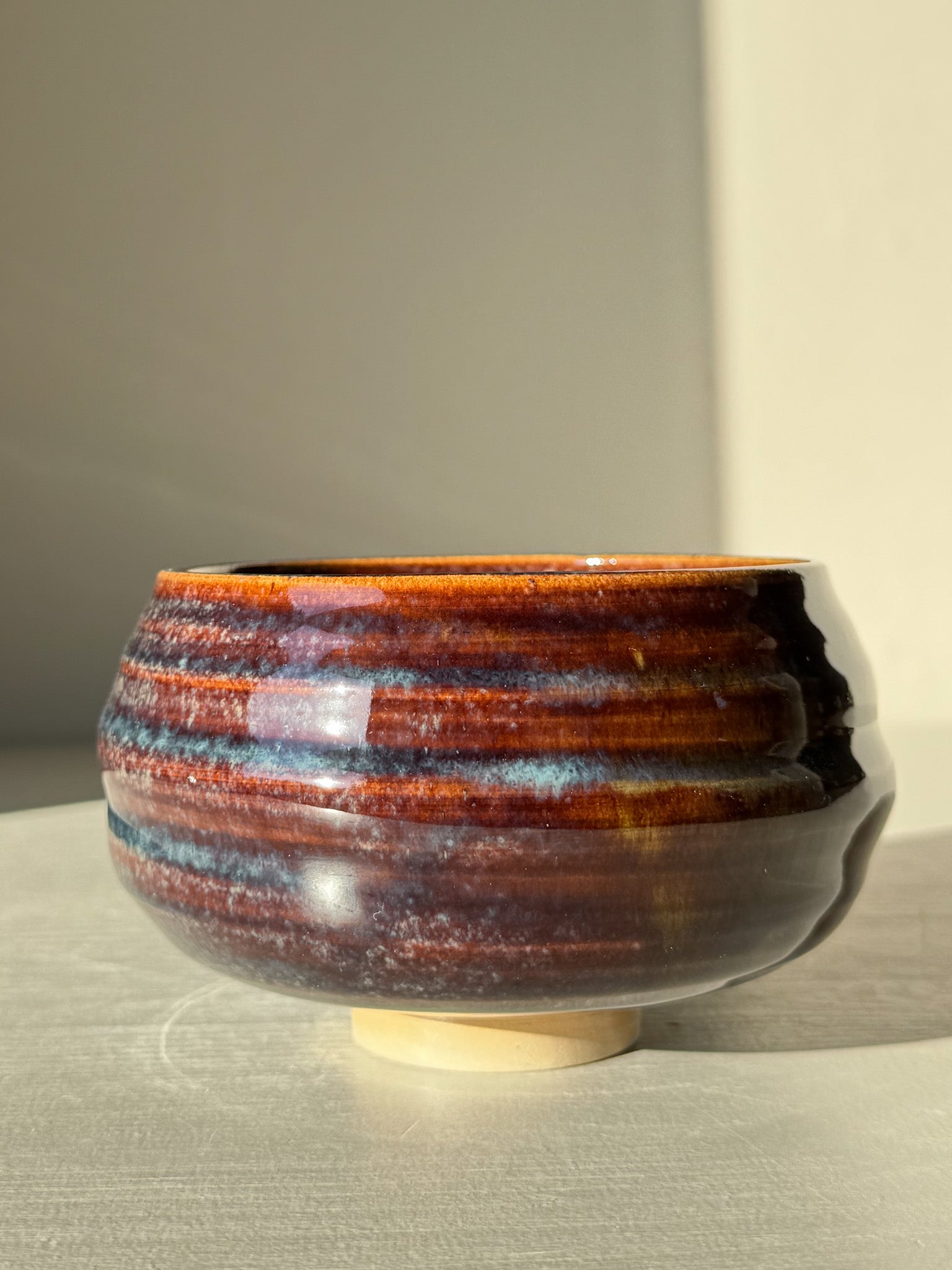 Matcha Bowl - Glossy Blue #01 with flowing blue and earthy tones, unique handcrafted design, and a smooth raised foot.