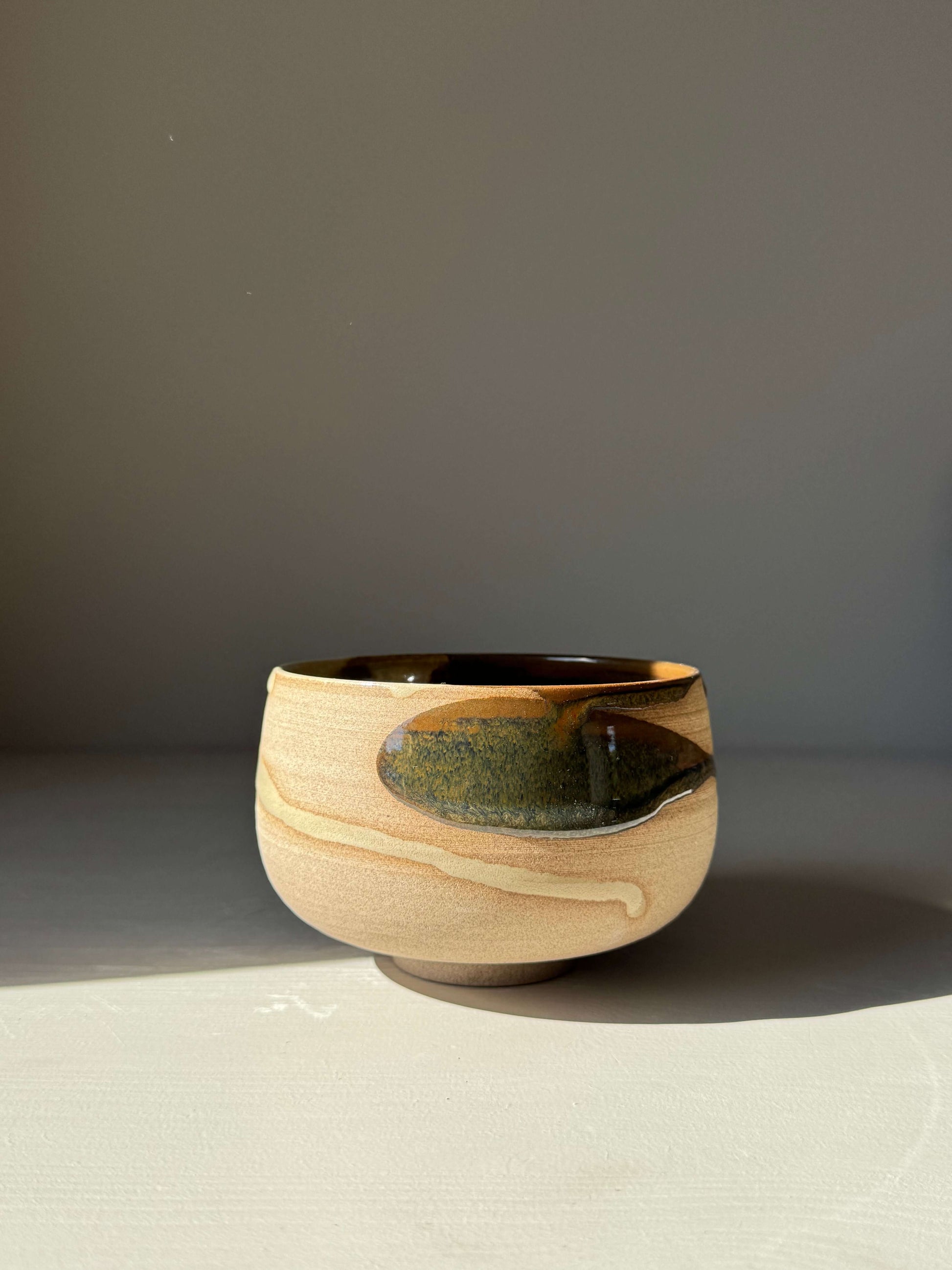 Matcha Bowl – Inyo Series #02 handmade ceramic with tenmoku and clear glaze on stoneware clay.