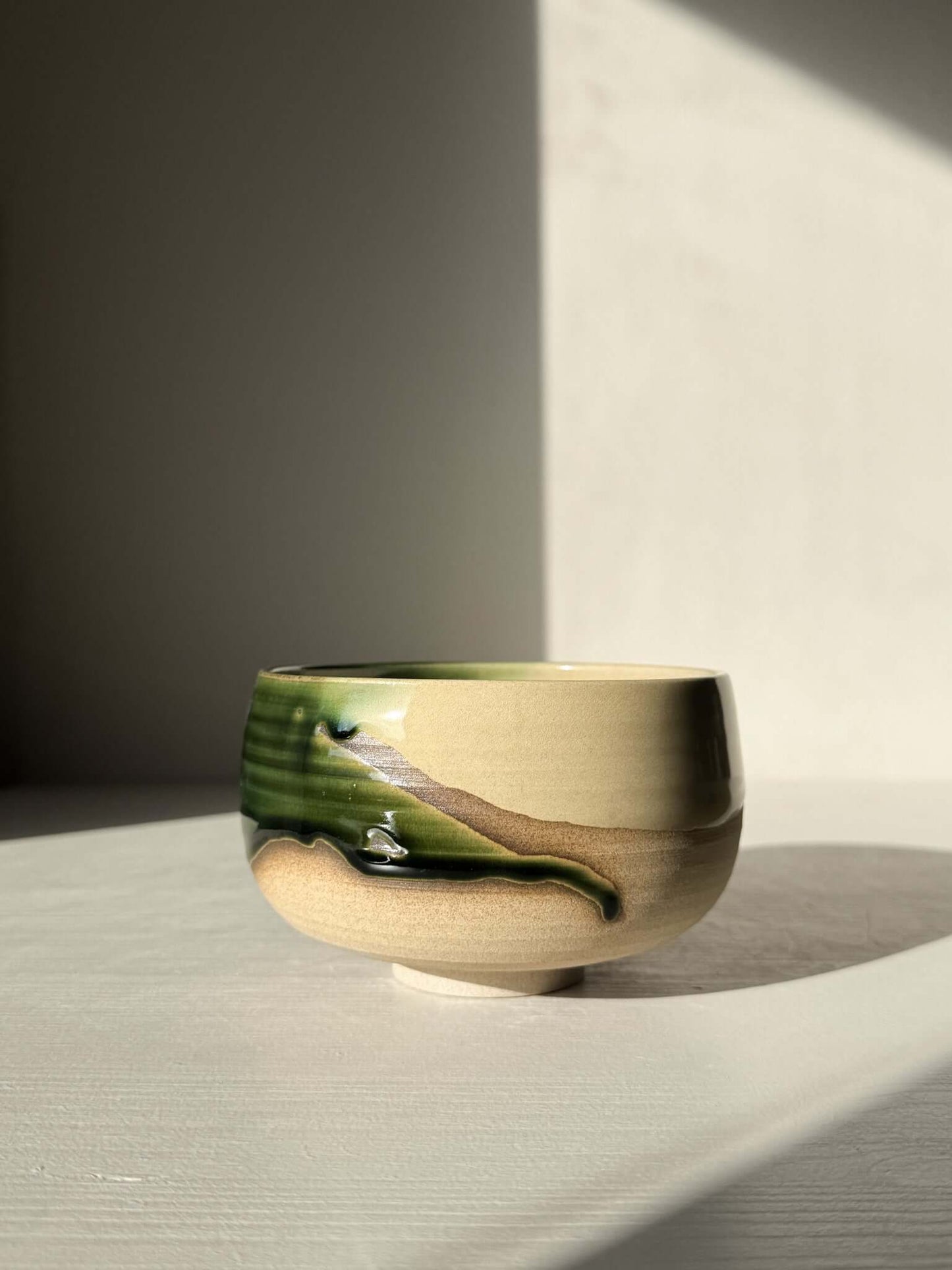 Matcha Bowl – Mori #02, handmade ceramic, featuring layered green and brown glazes, showcasing unique organic design.