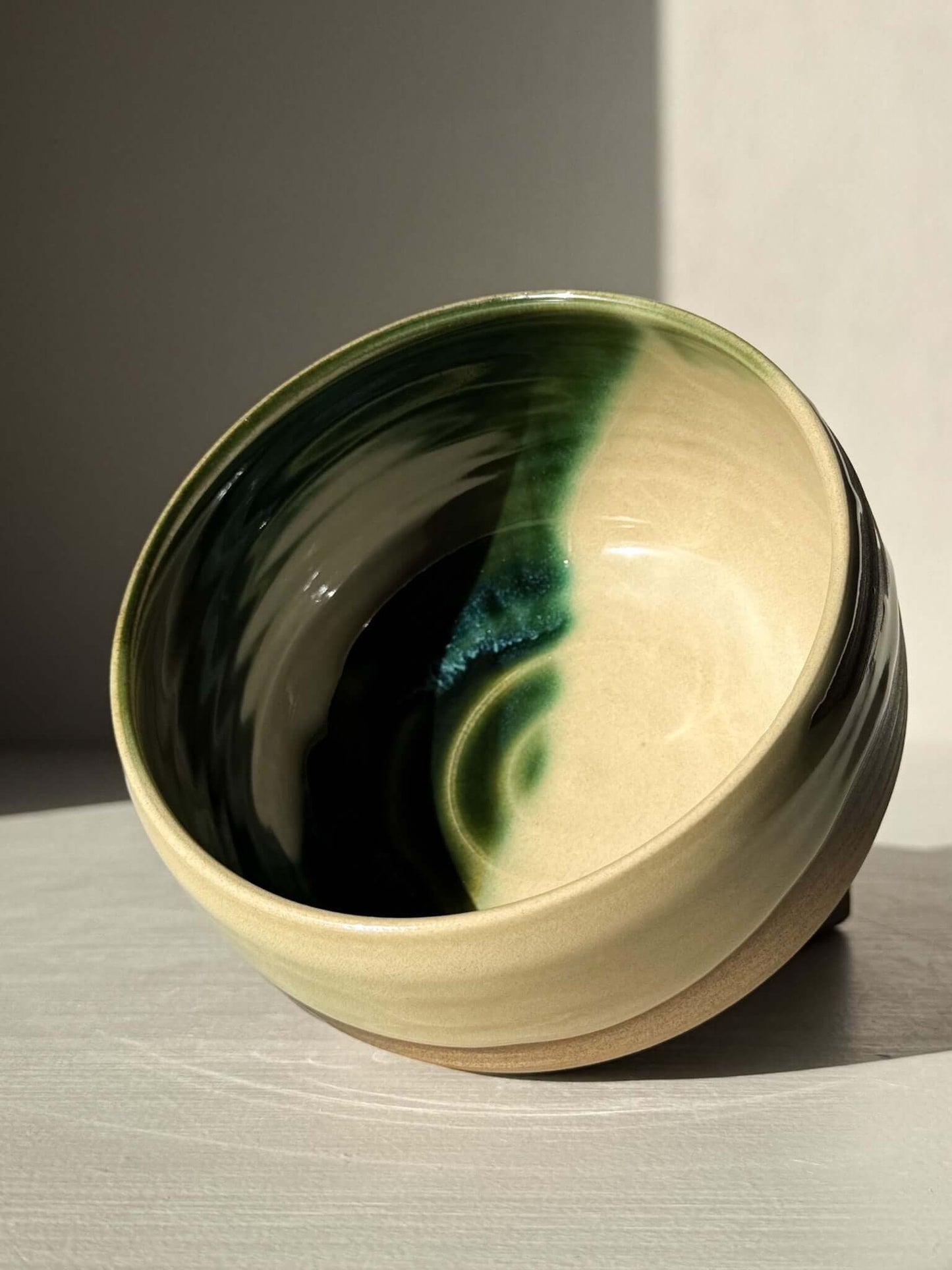 Handmade ceramic Matcha Bowl – Mori #03 with layered green and brown glazes, featuring organic, spontaneous color blending.