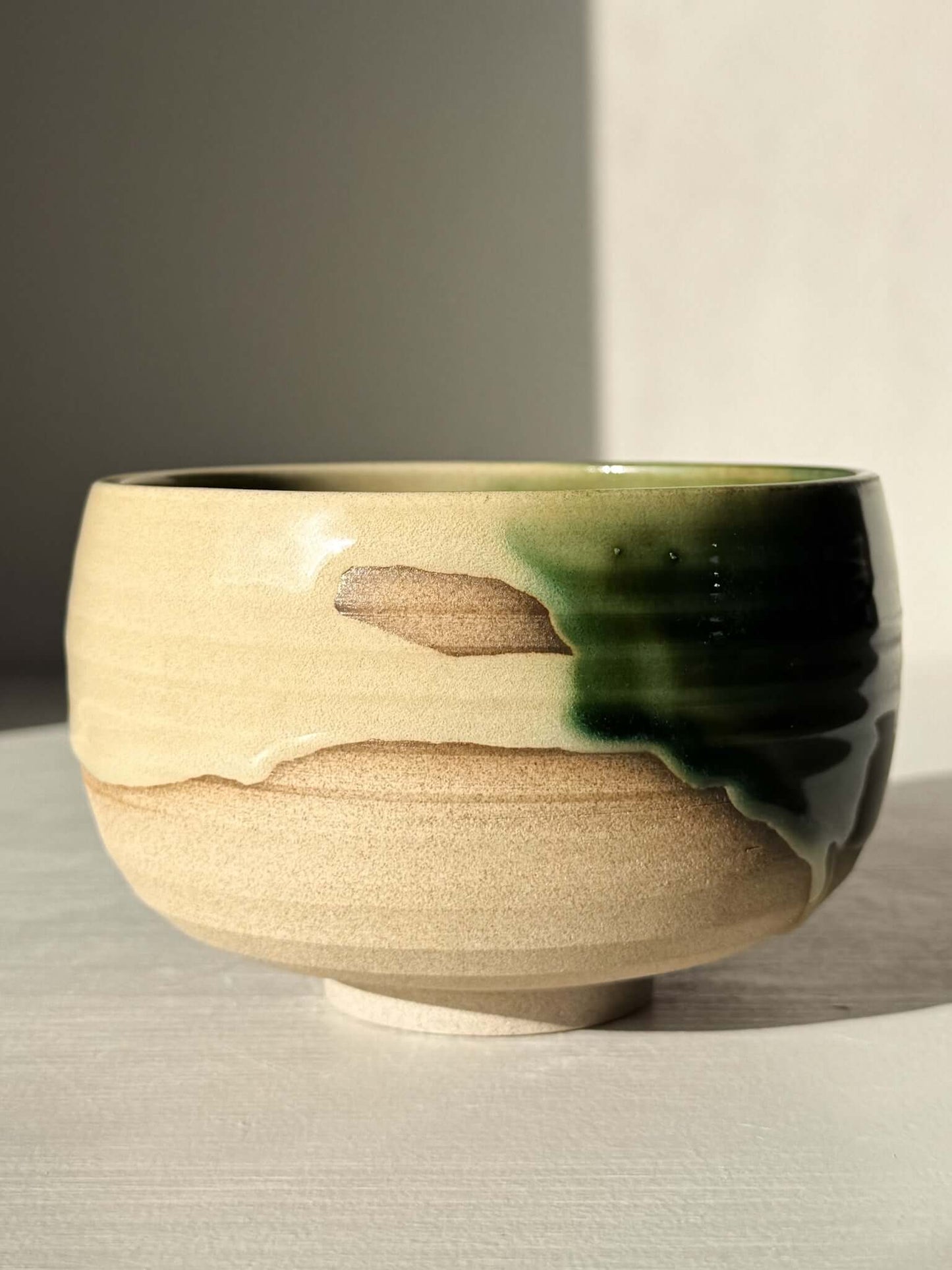 Handmade ceramic Matcha Bowl – Mori #04 with natural stoneware and green-brown glaze, part of the Mori Series.