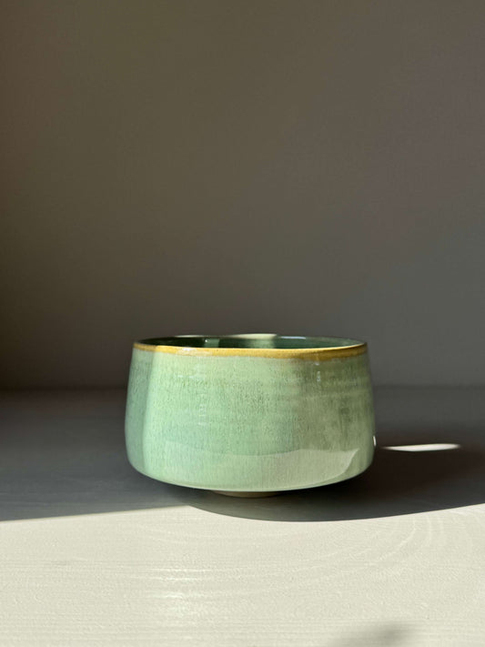 Handmade ceramic Matcha Bowl – Sage Glaze with golden rim, soft sage-green tone, perfect for frothy matcha preparation.