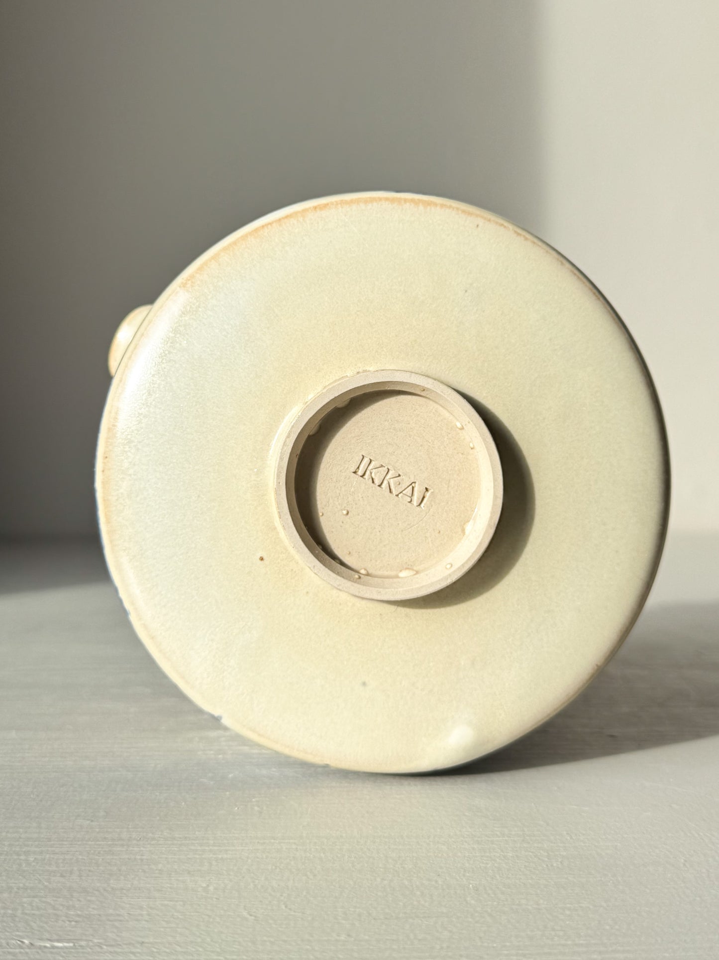 Base of Matcha bowl Spout - Moonstone & Blue #02, showcasing delicate craftsmanship and smooth moonstone glaze finish.